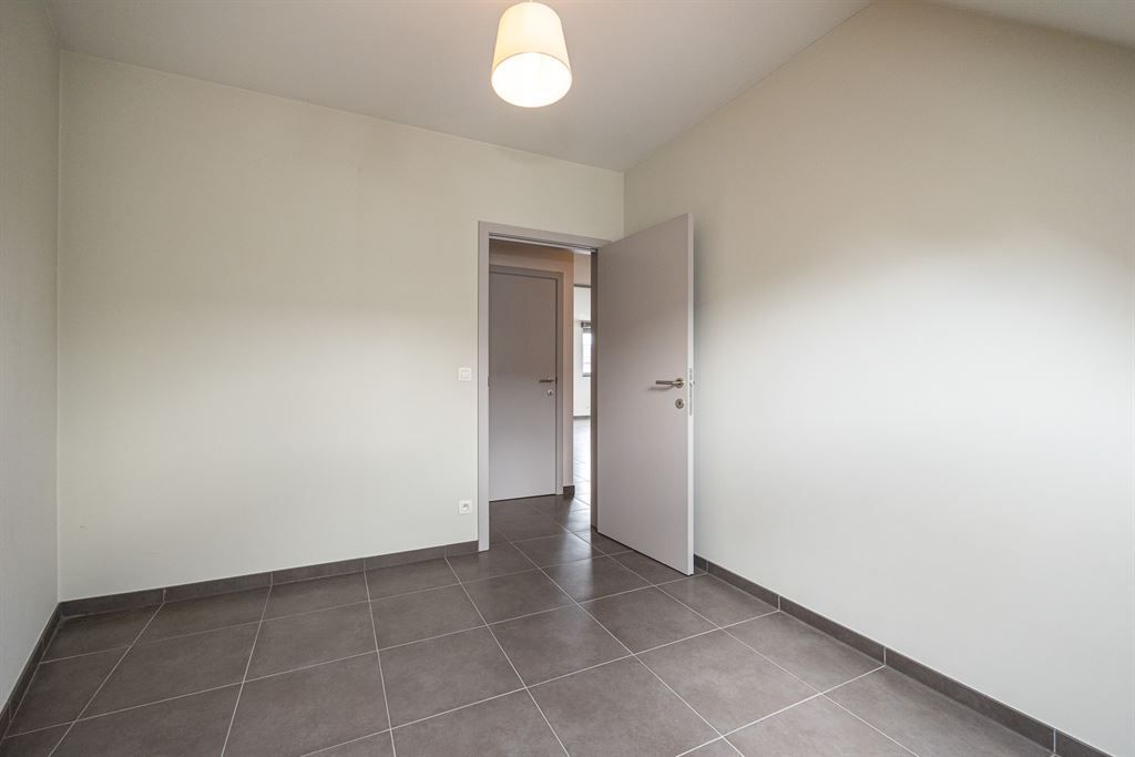 Zeer ruim duplexappartement in hartje Herent! foto 12