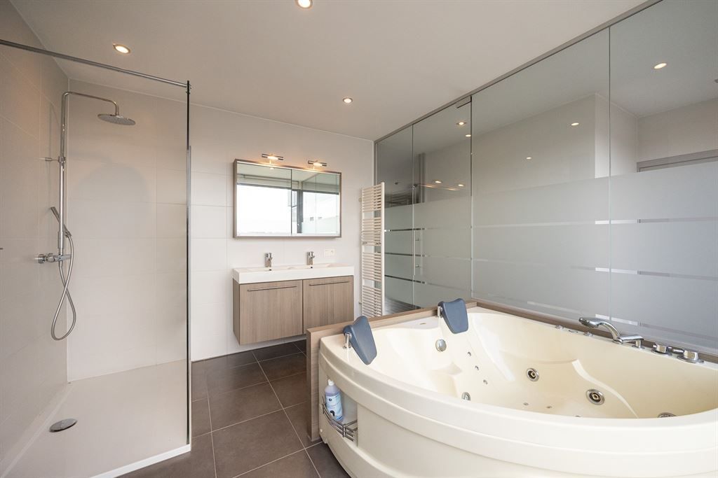 Zeer ruim duplexappartement in hartje Herent! foto 12