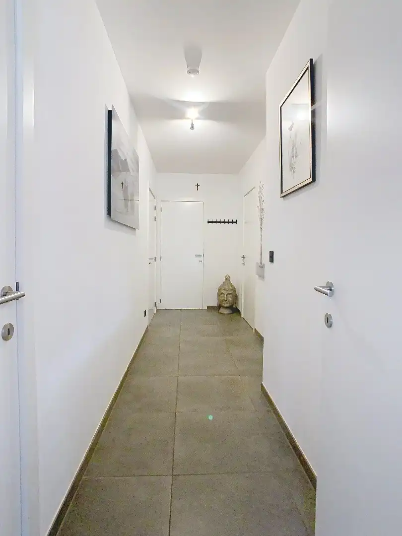 Recent gelijkvloers appartement met tuin, 2 slaapkamers en dressing foto 10