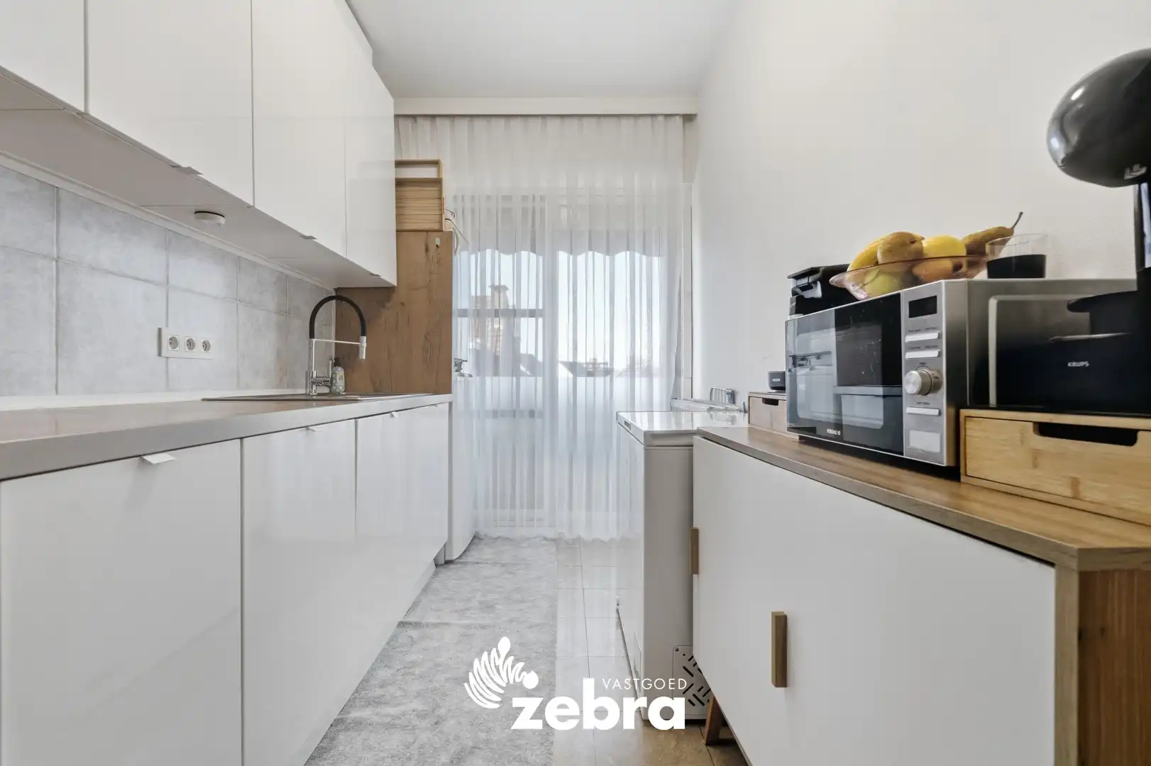 Gerenoveerd appartement met 2 slaapkamers in centrum Tielt! foto 8