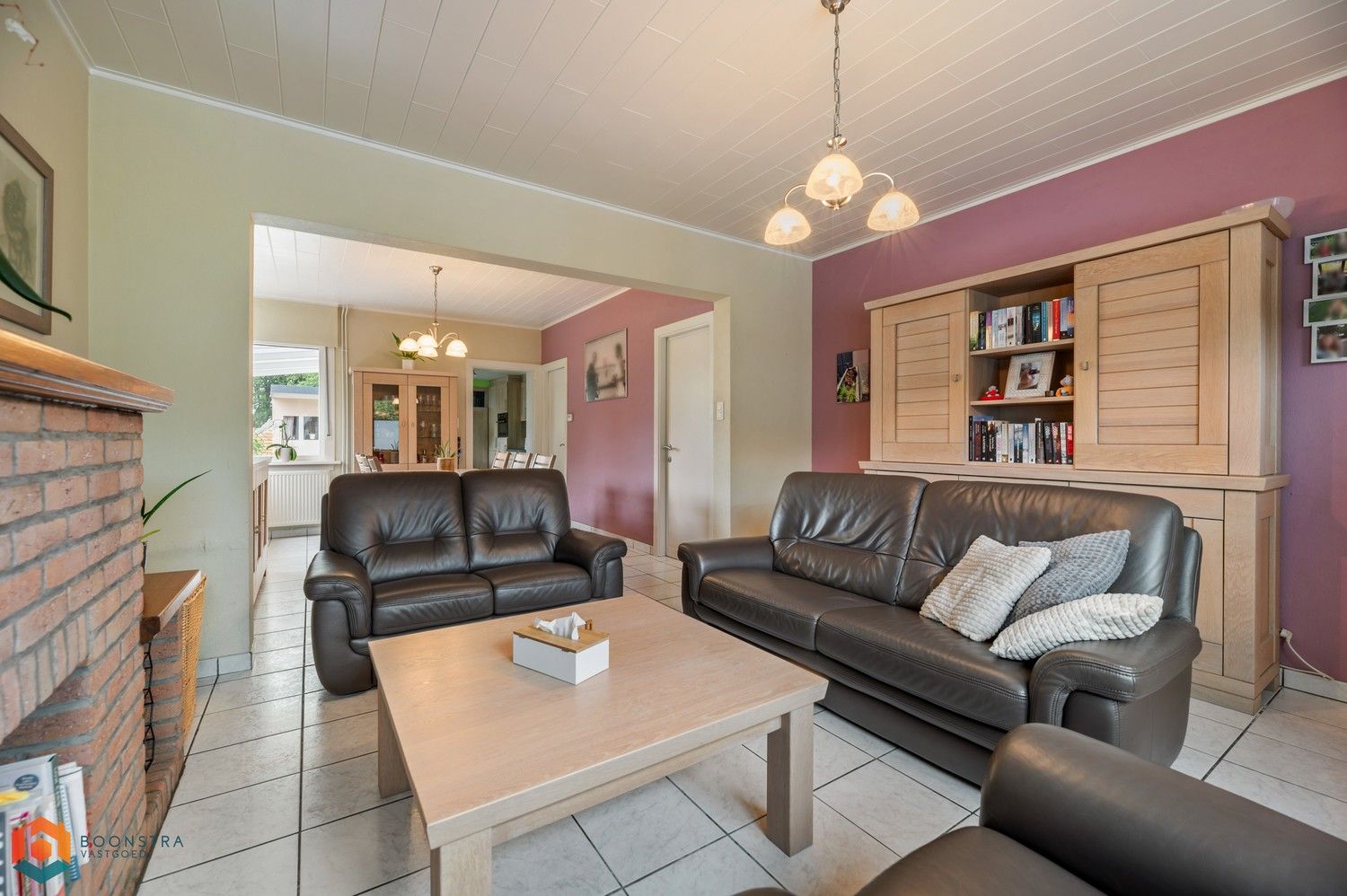 Verzorgde woning met 2 slpkrs, leuke tuin en garage foto 3