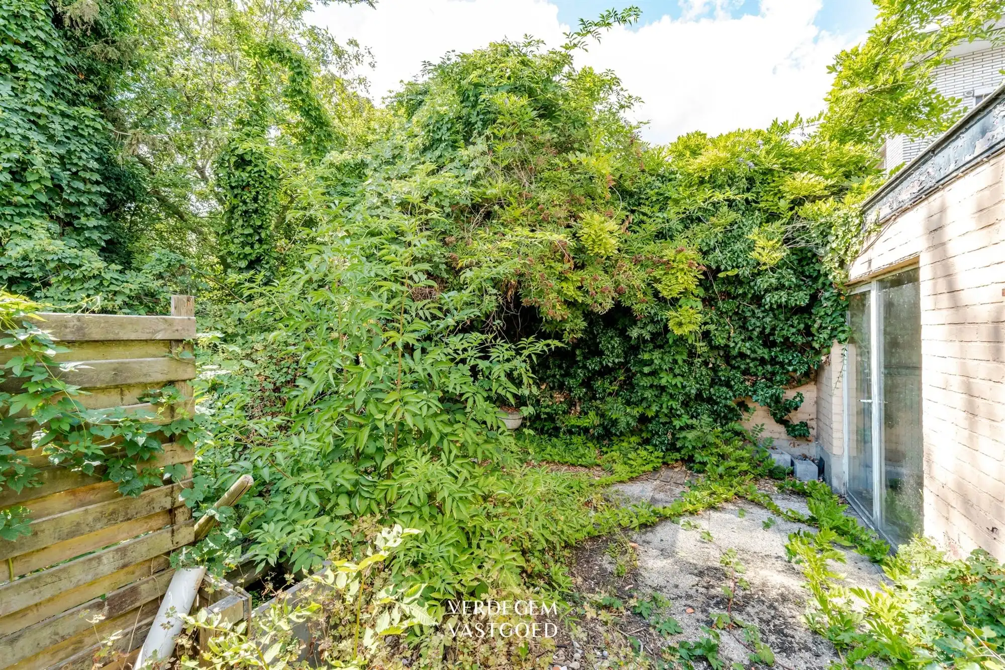 Renovatieproject: centraal gelegen handelspand met woonst en tuin foto 19