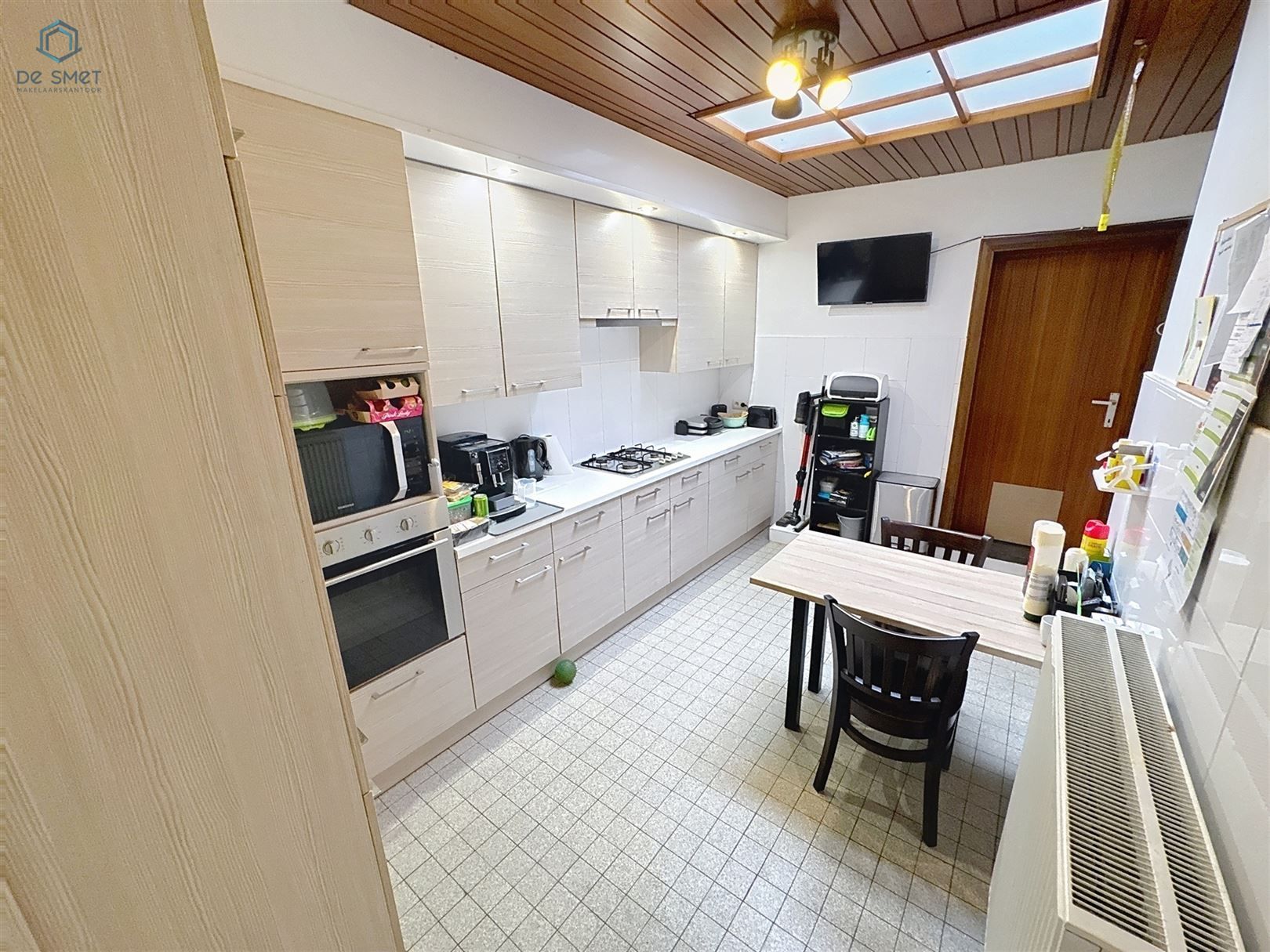 Instapklare gezinswoning met 3 slaapkamers, garage, atelier en prachtige tuin in het hart van de Vlaamse Ardennen foto 4