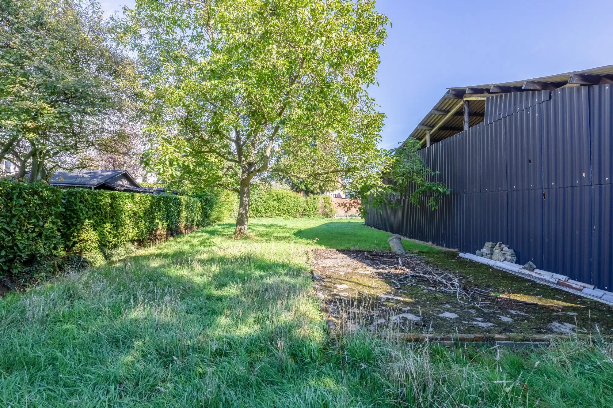Voormalige hofstede met stallingen op perceel van 3016 m² dicht bij het centrum van Sint-Niklaas foto 18
