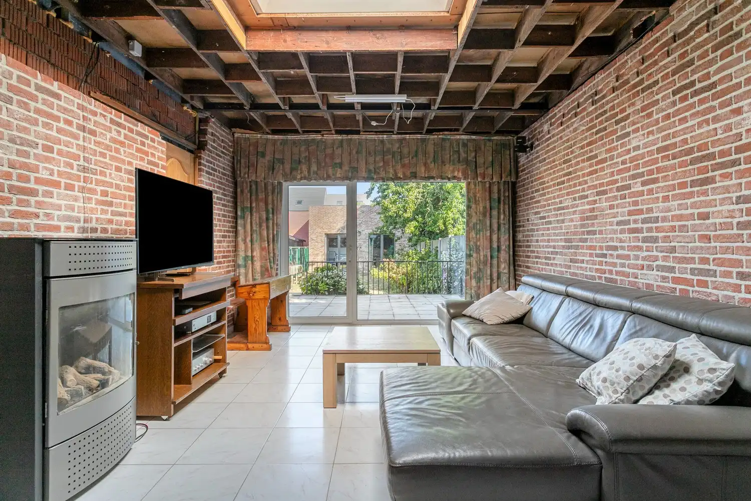 Karaktervolle stadswoning met renovatiepotentieel en unieke troef foto 6