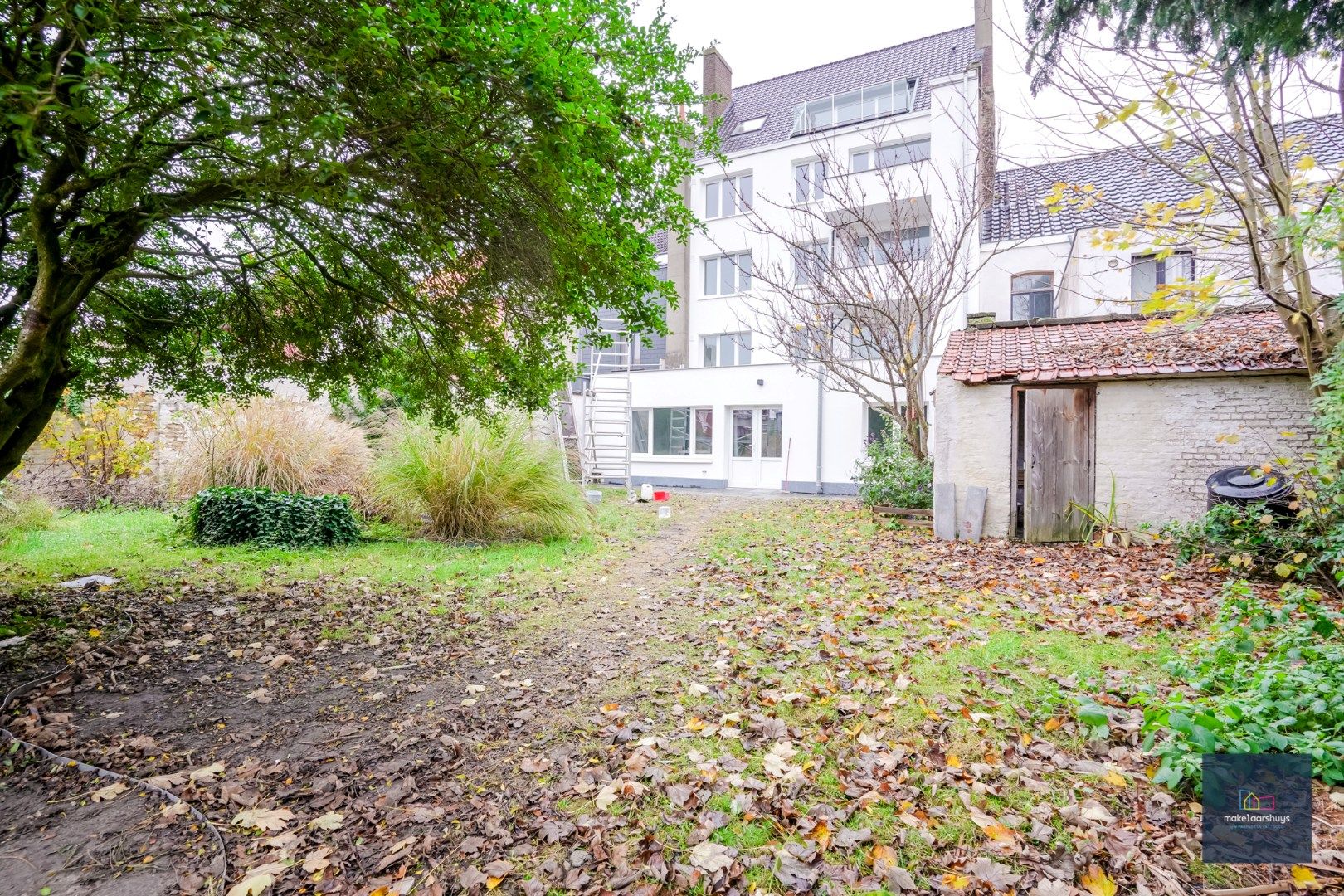 Ruim gelijkvloersappartement met 2 slaapkamers , een  zuidgeorienteerde  tuin en garage foto 3