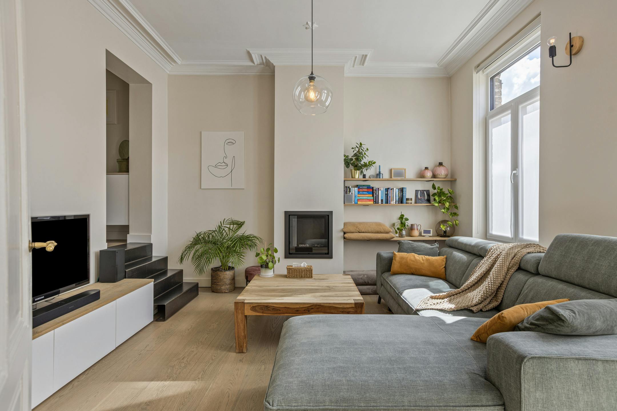 Gerenoveerde herenwoning met 3 slaapkamers en tuin. foto 2