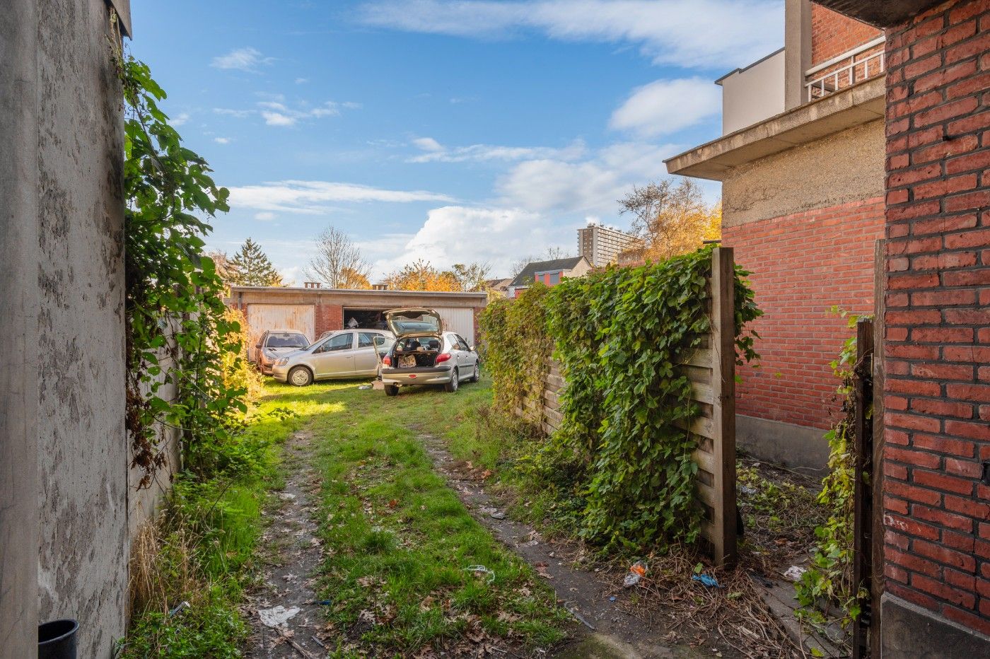 Te renoveren opbrengsteigendom met 3 app. en 3 garageboxen foto 16