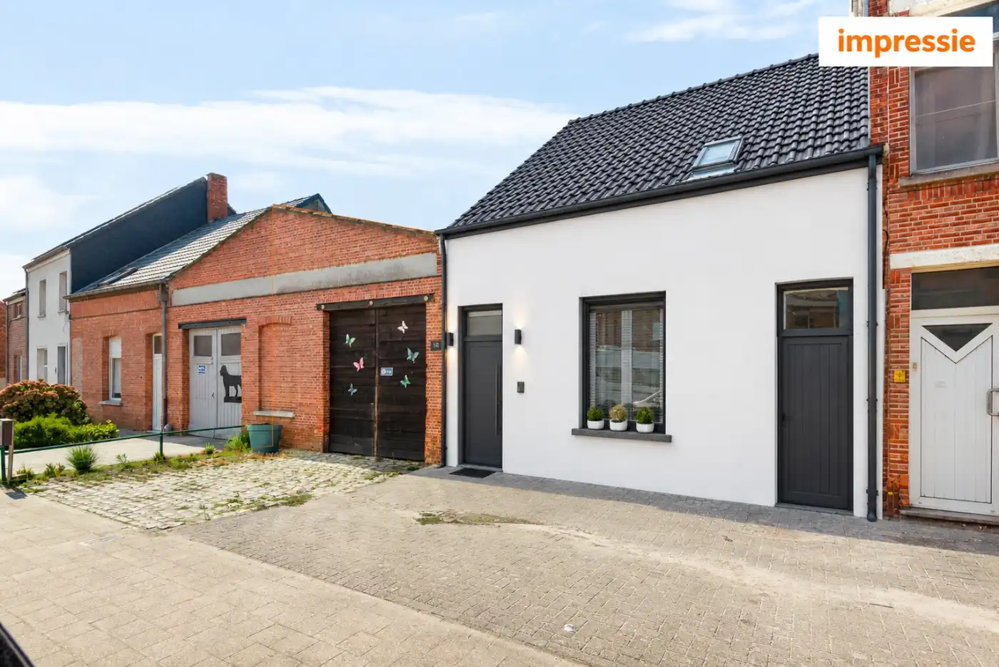 Instapklare gezinswoning met 3 slaapkamers, werkplaats, ruime tuin en tal van mogelijkheden foto 2