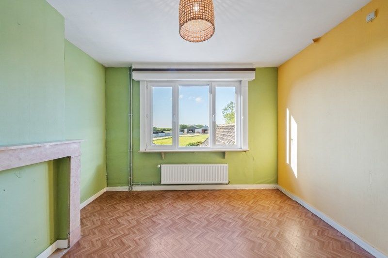 Te renoveren woning met een ruime tuin en zolder – een unieke kans! foto 7