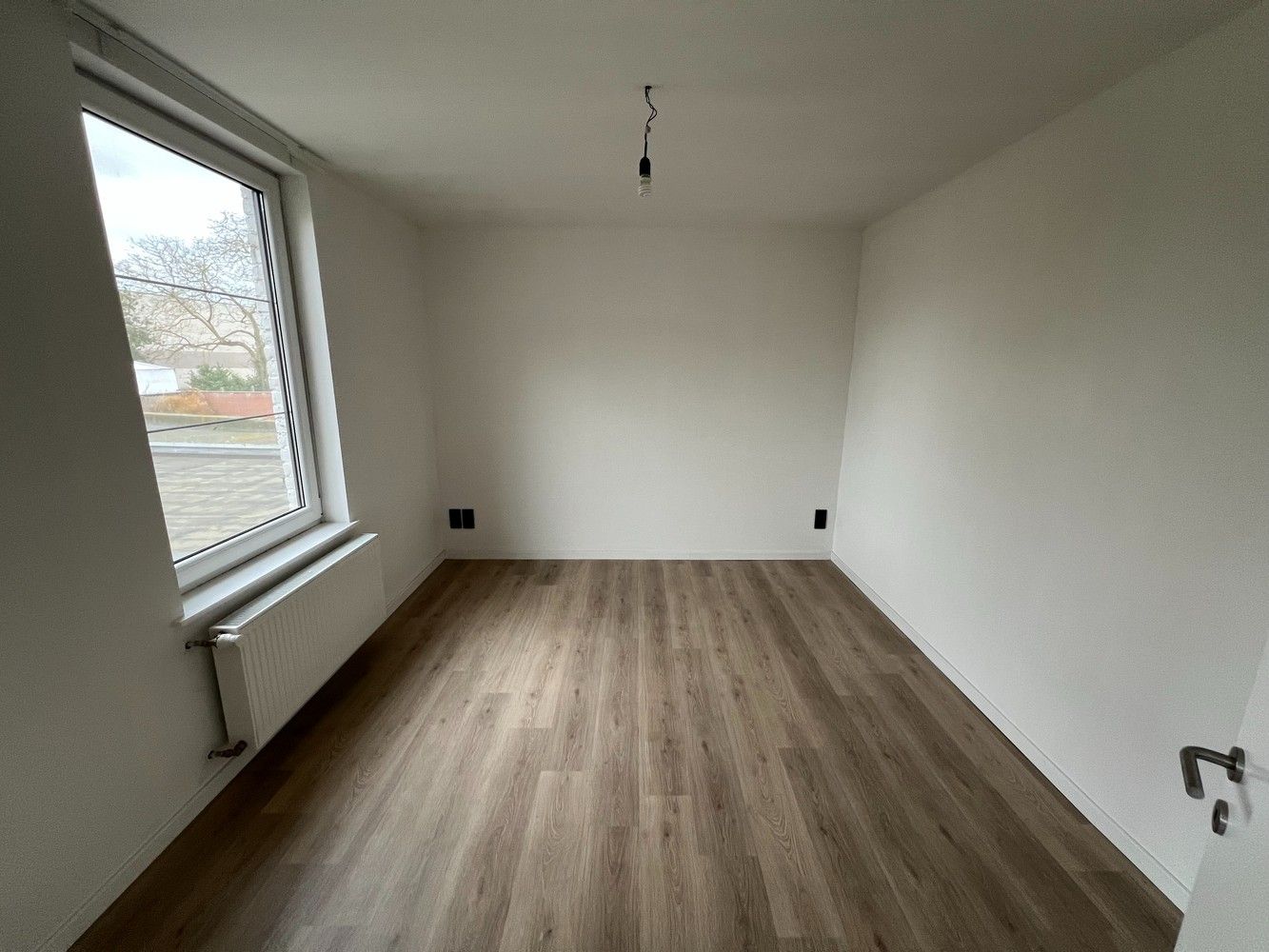 Gerenoveerd appartement met 3 slaapkamers en garage! foto 5