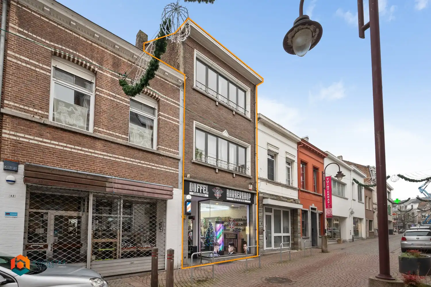 Hoofdfoto van de publicatie: Kleinschalig gebouw met 2 app. en handelsgelijkvloers in centrum Duffel