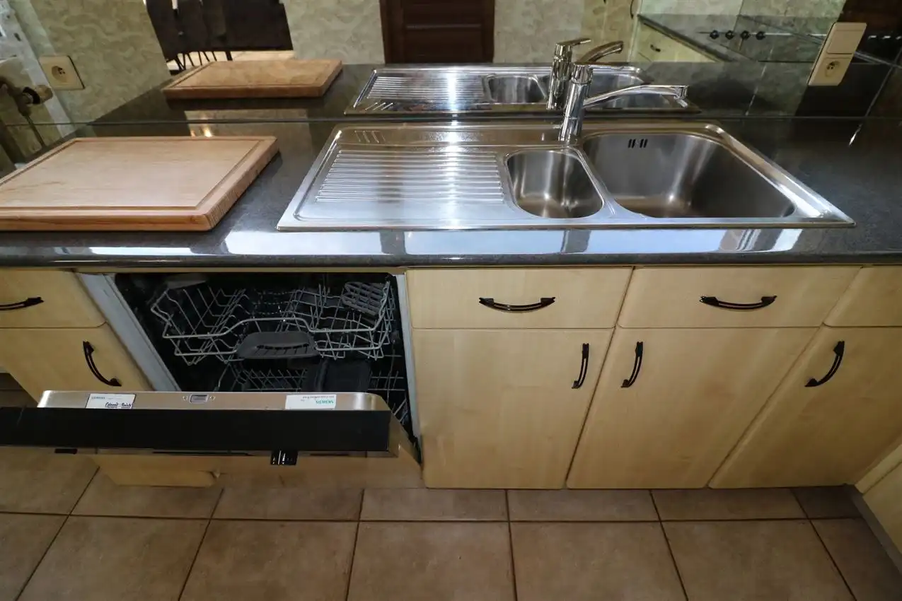 Gusting gelegen woning met 3 slp, garage en tuin foto 10