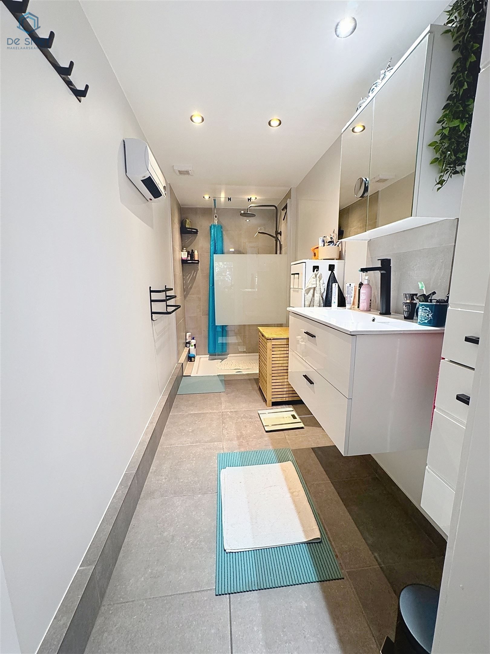 Instapklare woning met 3 slaapkamers, stadstuintje, berging en carport in rustige straat nabij centrum Brakel foto 8