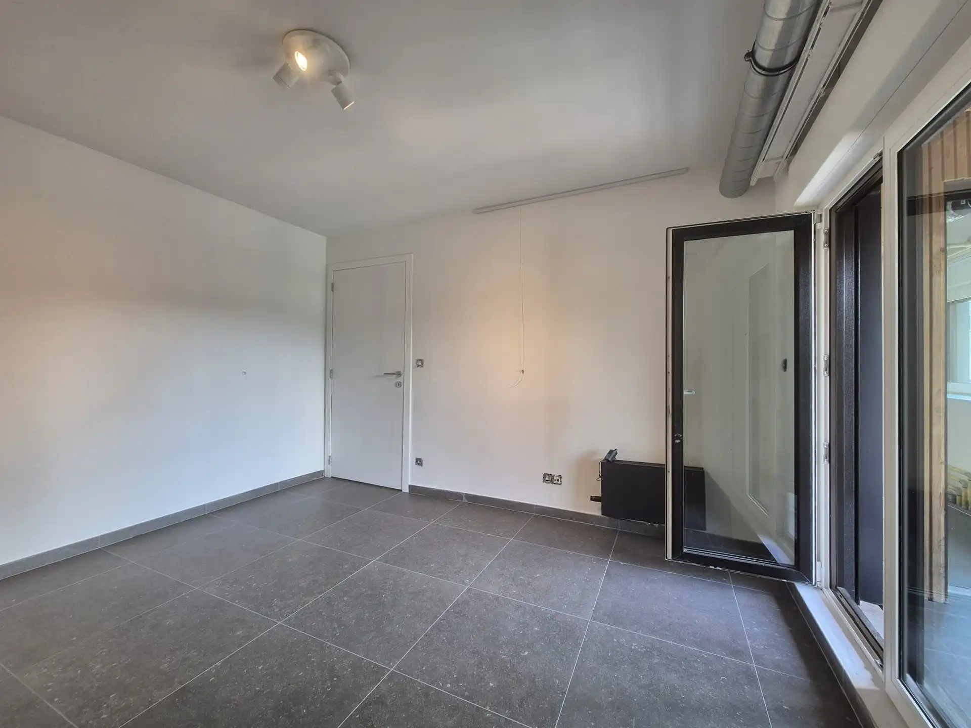 Volledig gerenoveerd energiezuinig appartement met 1 slaapkamer, rustig gelegen aan het bos van Wetteren foto 13