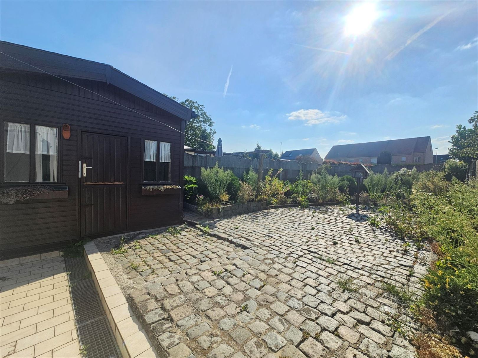 Half-open bebouwing met garage en tuin foto 15