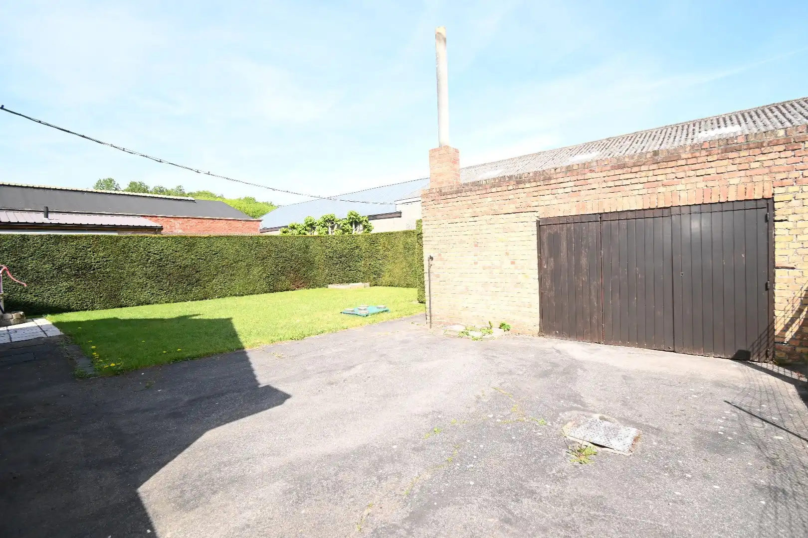 Alleenstaande woning met garage en tuin  foto 7