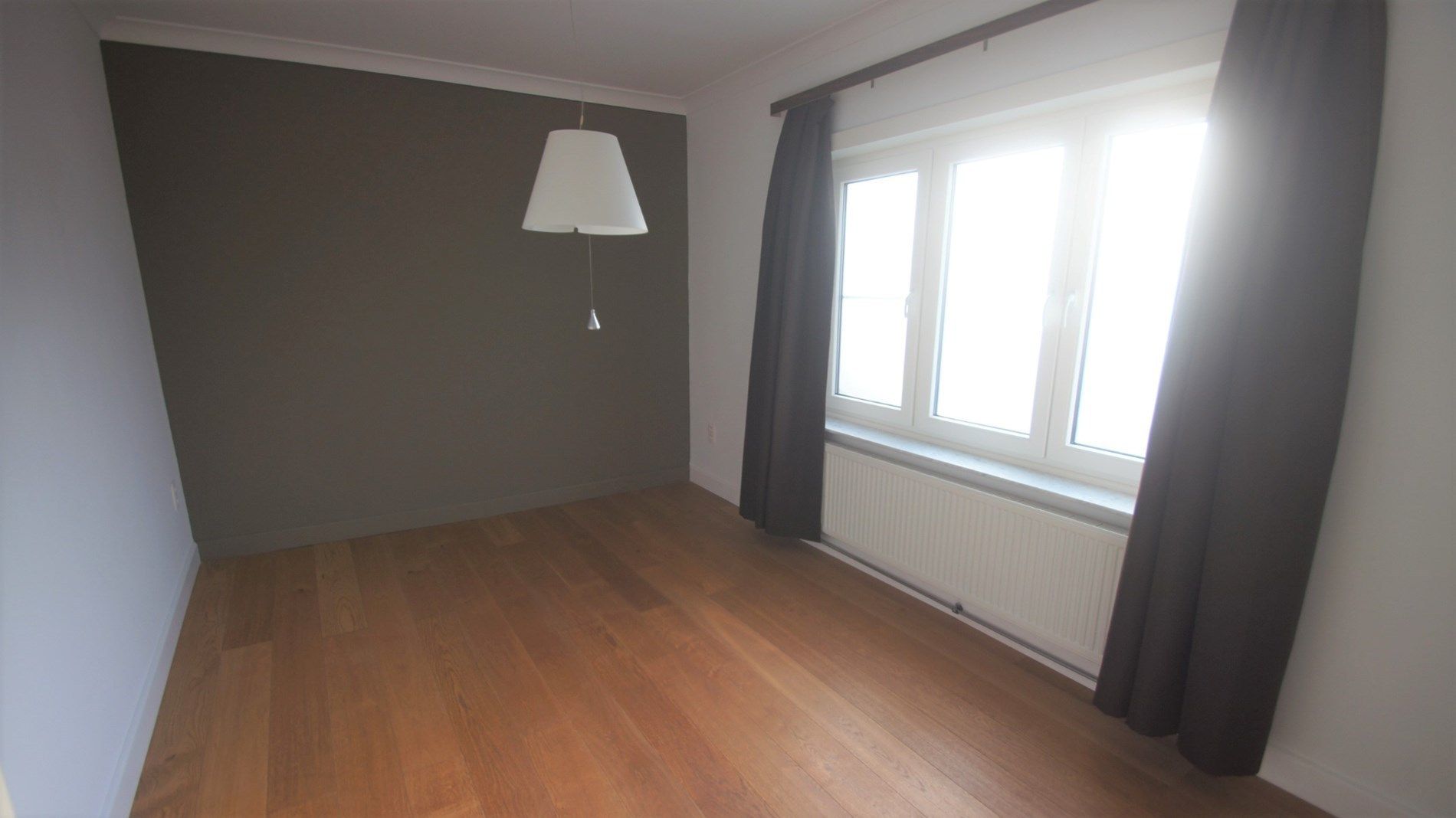 Mooi gelegen woning met tuin/terras, 2 slpks en garage foto 8