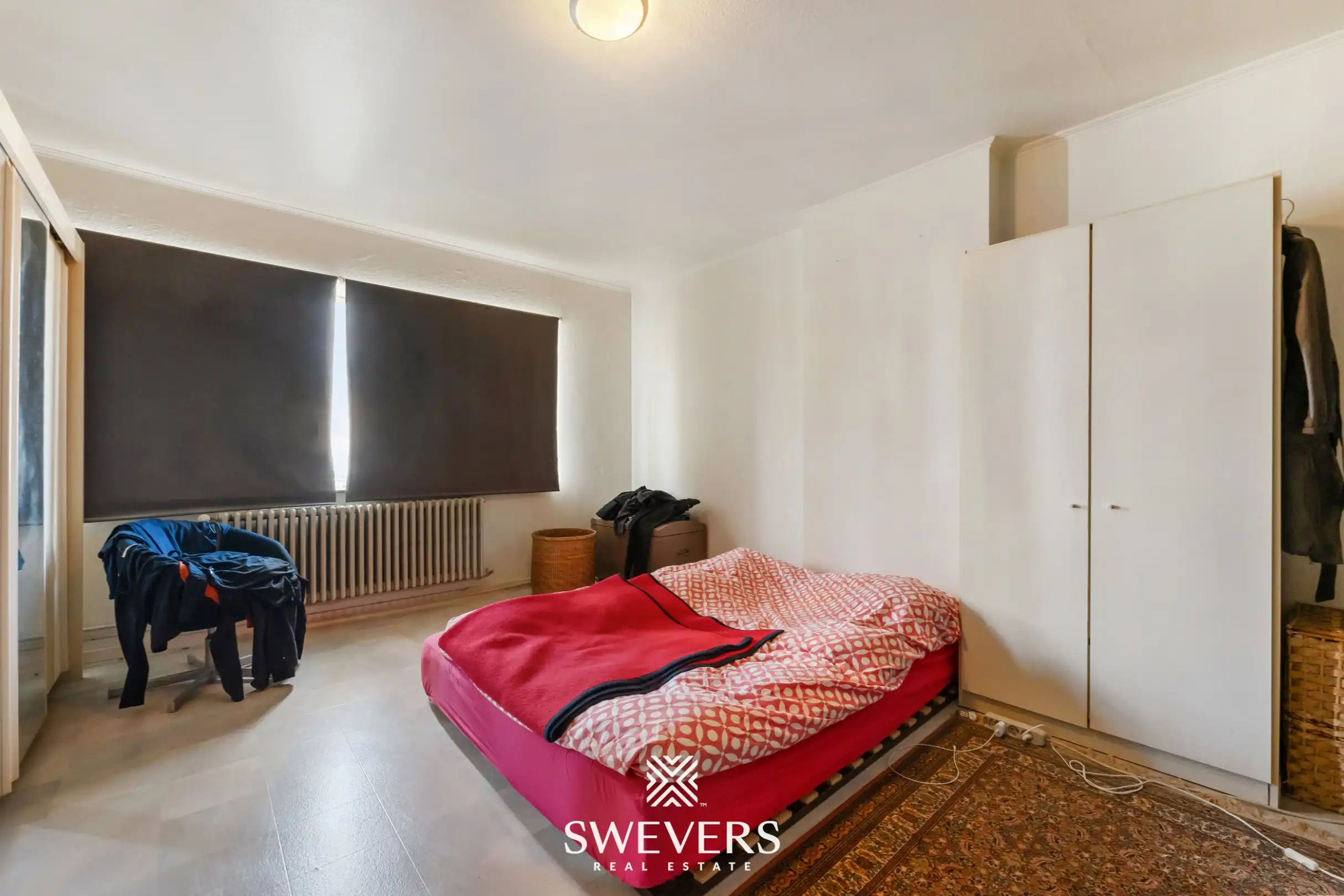 Ruime halfopen bebouwing met 4 slaapkamers en veel renovatiepotentieel op topligging in Hasselt foto 15