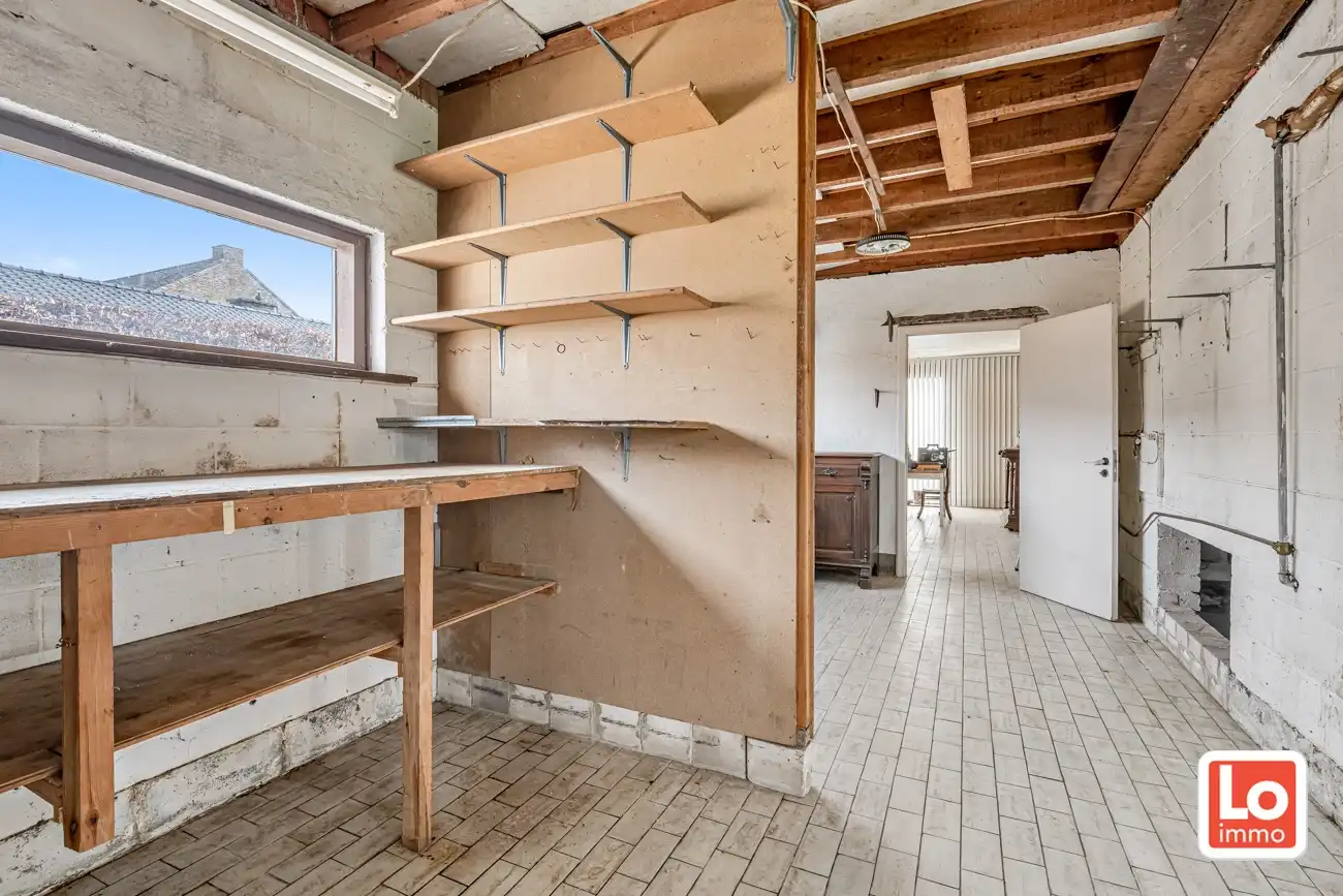 Ruime volledig te renoveren open gelijkvloerse prefab woning met inpandige garage en tuin met open zicht of perceel bouwgrond met afbraak/heropbouw mogelijkheden aan 6% BTW op een rustige locatie nabij het centrum van Zeveneken! foto 25