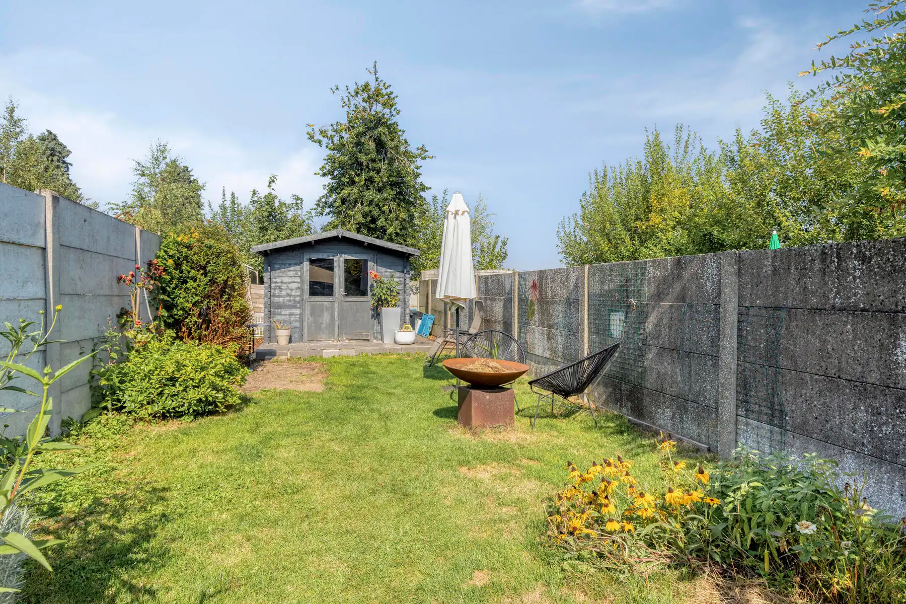 Instapklare woning met gezellige tuin en terras in het centrum van Opwijk! foto 28