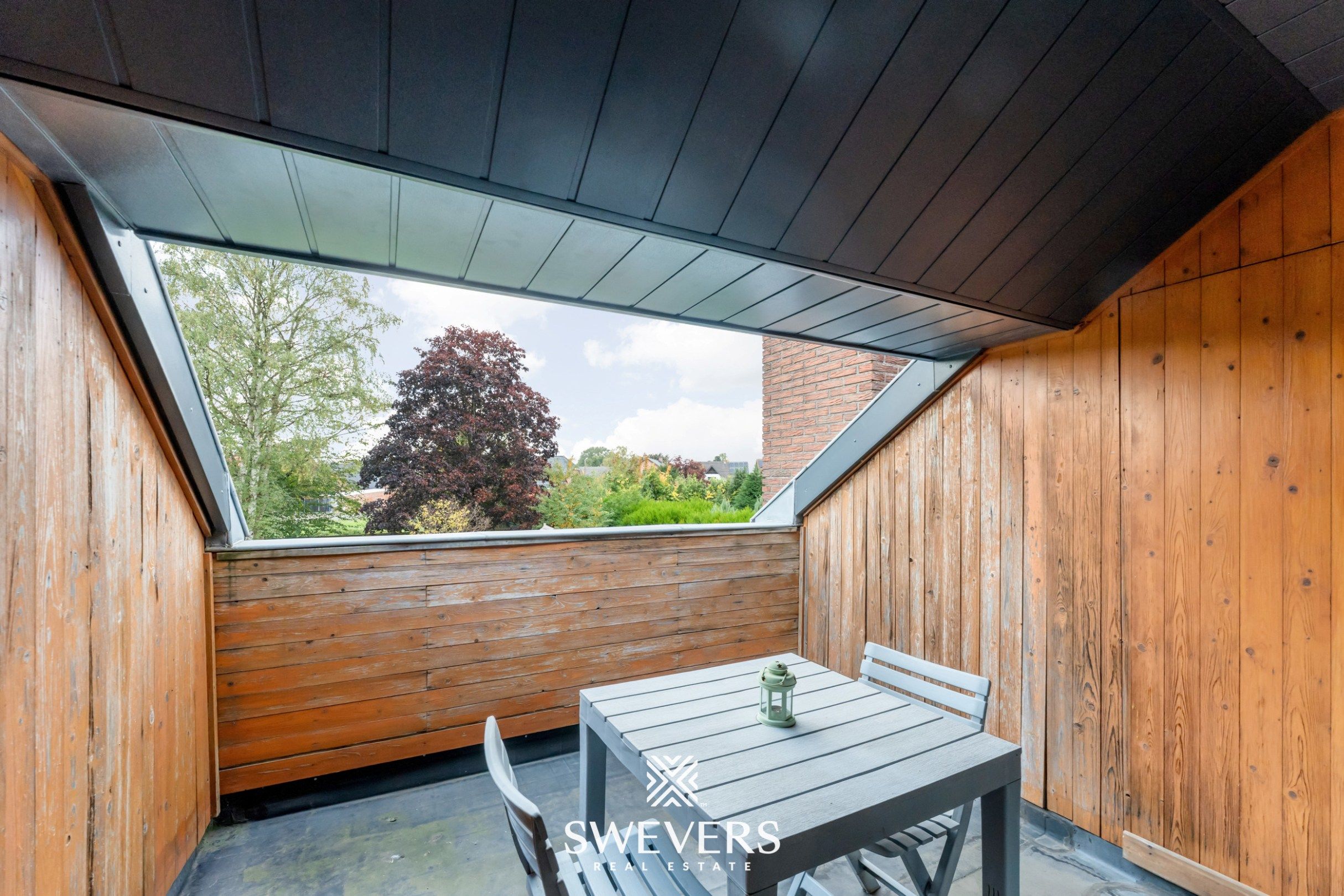 Knusse, hedendaagse gezinswoning met warme indeling en grote, zonnige tuin foto 29