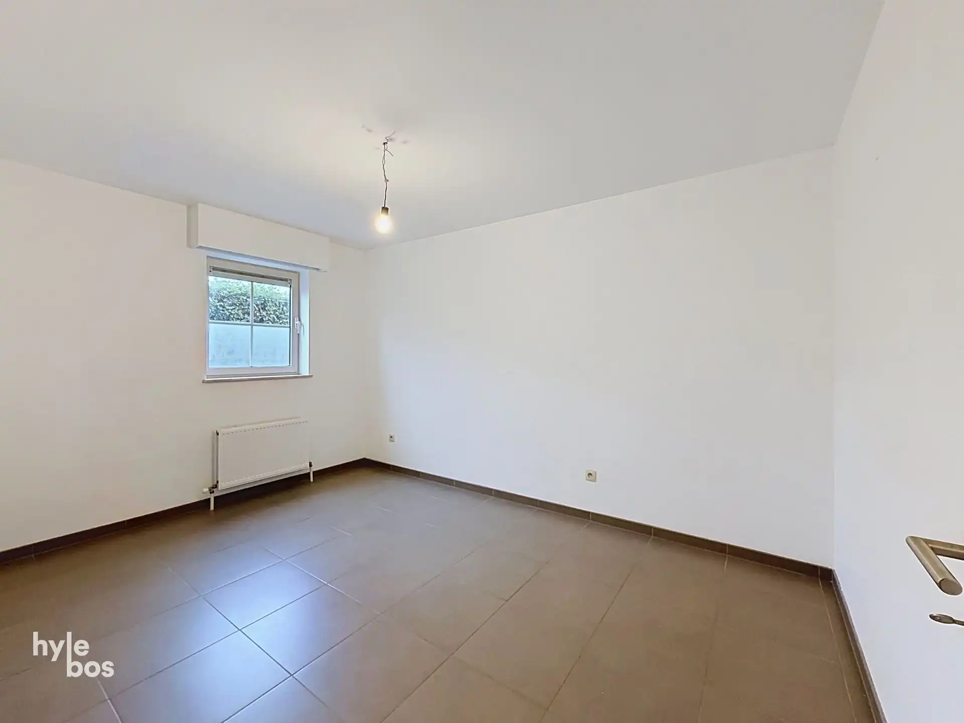Aan de stadsrand gelegen gelijkvloers appartement foto 12