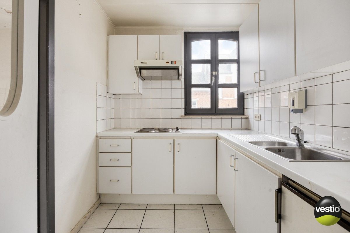 Handelspand met woonst / projectopportuniteit aan de Luikersteenweg. foto 12