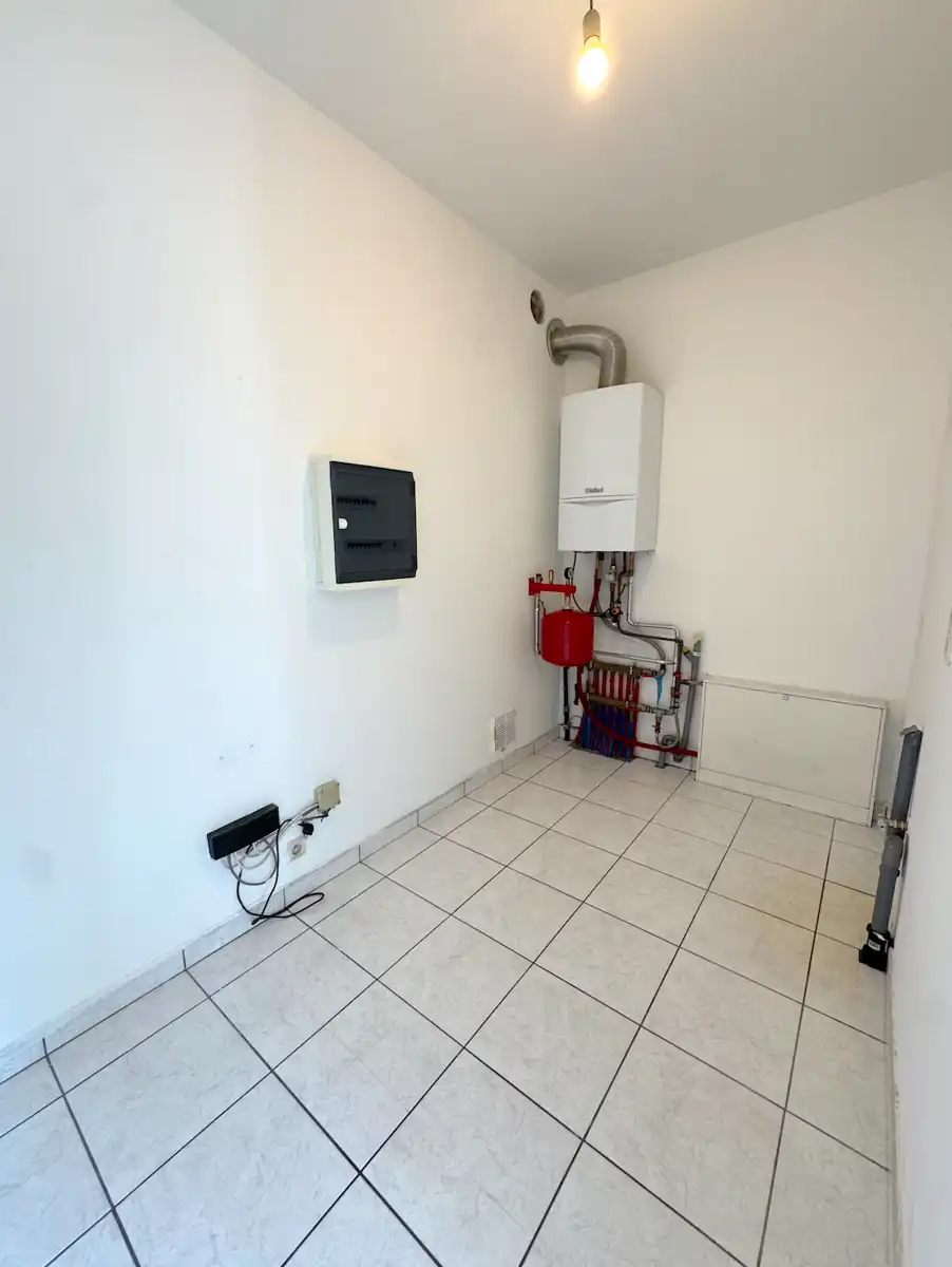 Instapklaar appartement met 2 slaapkamers én garage! foto 11