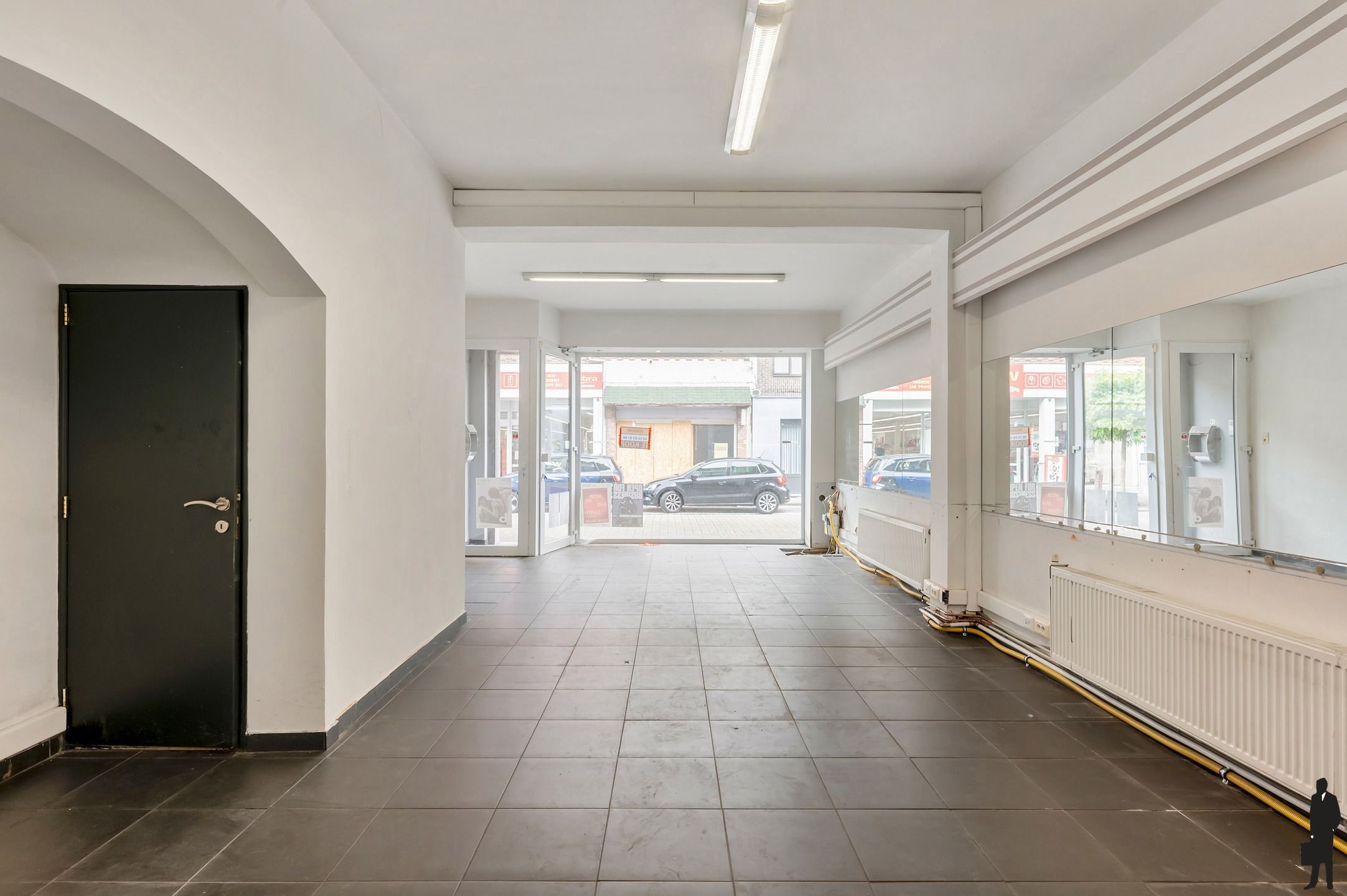 Handelsgelijkvloers met gerenoveerde triplex in het centrum! foto 5