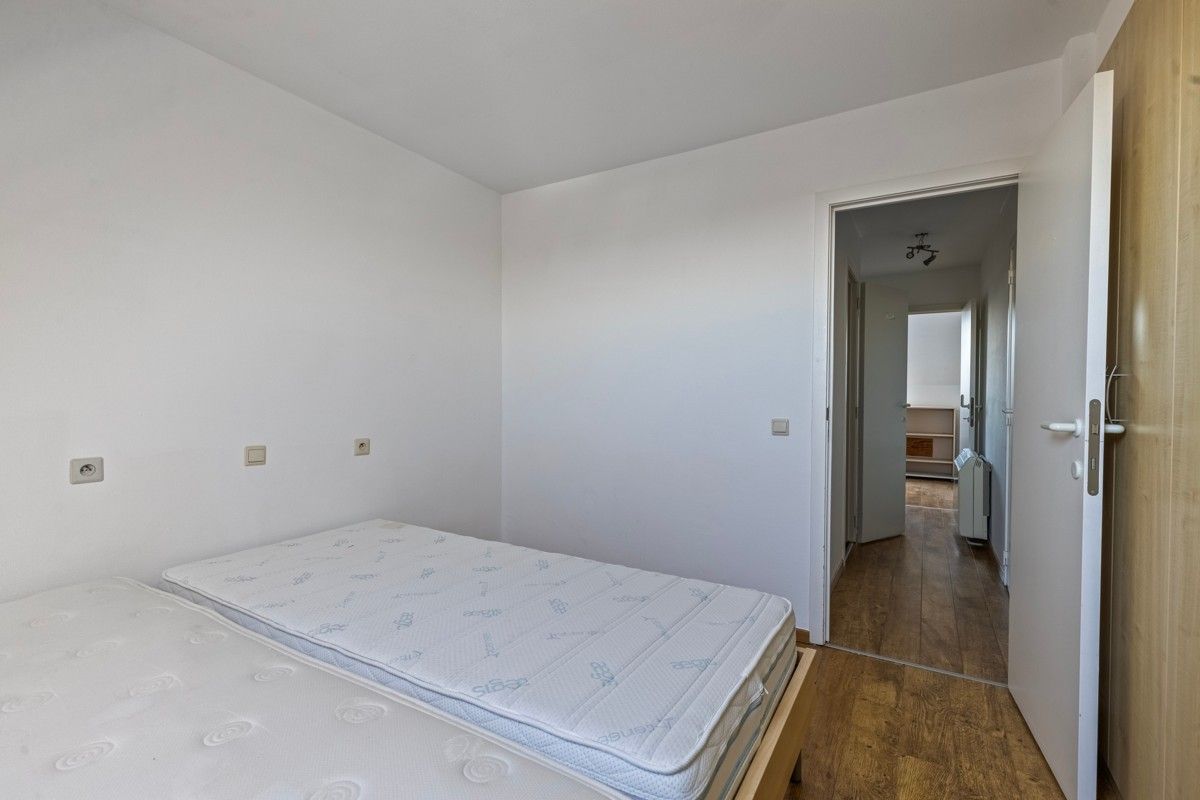 Ruim appartement met drie slaapkamers, twee terrassen en parking te koop! foto 8