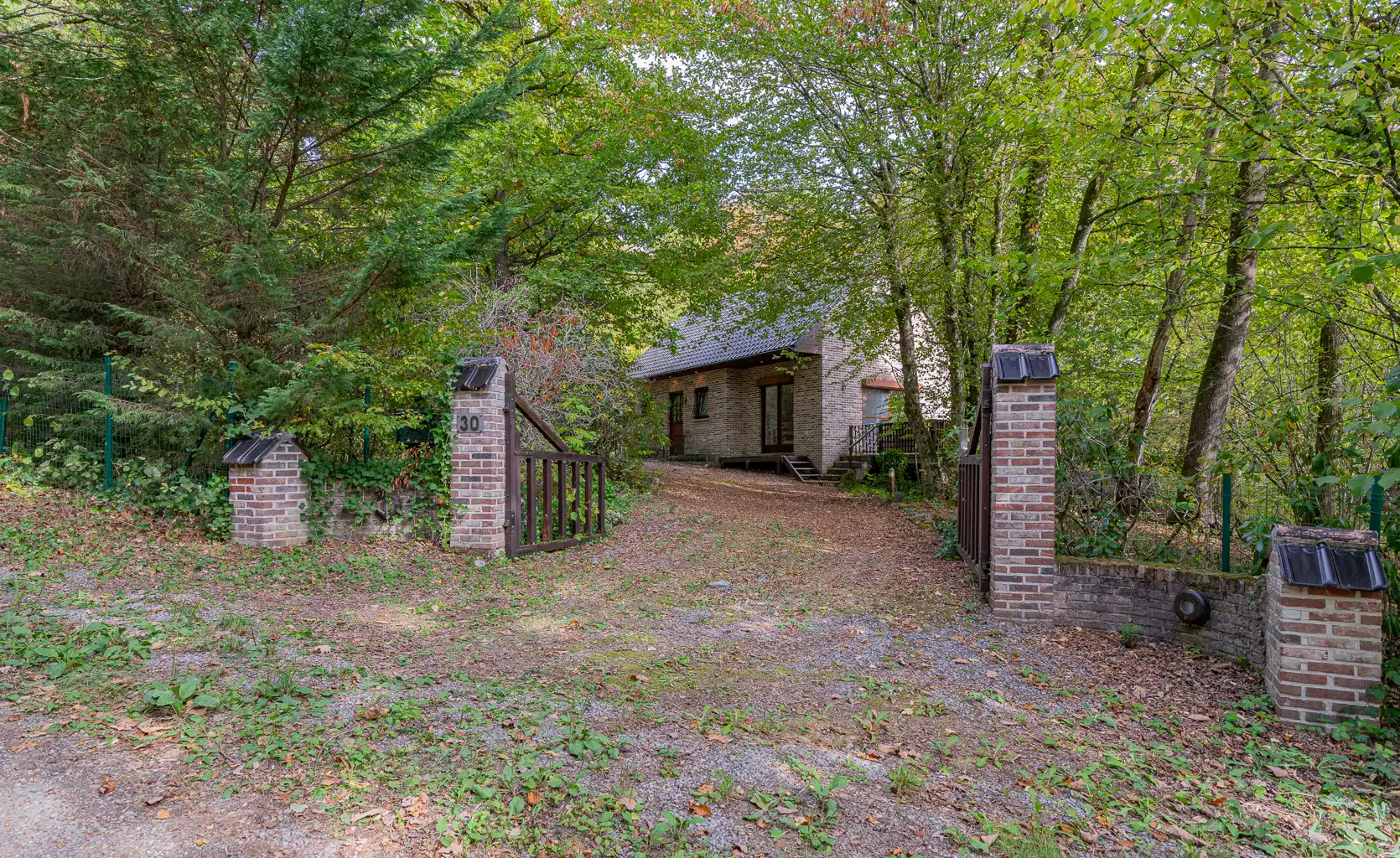 Woning gelegen in de bossen! foto 28