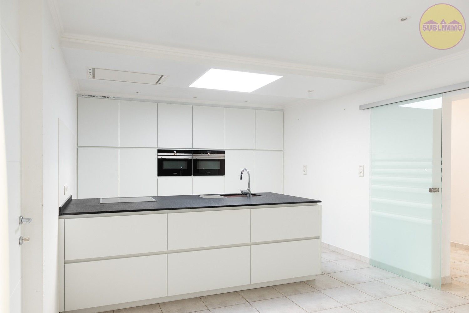 Ruime woning met afzonderlijk appartement op een perceel van 858 m² in Mol. foto 7