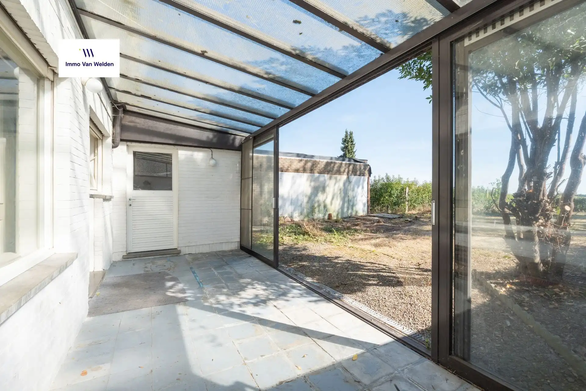 Te renoveren halfopen woning met garage en tuin in landelijke omgeving te Wortegem-Petegem. foto 10