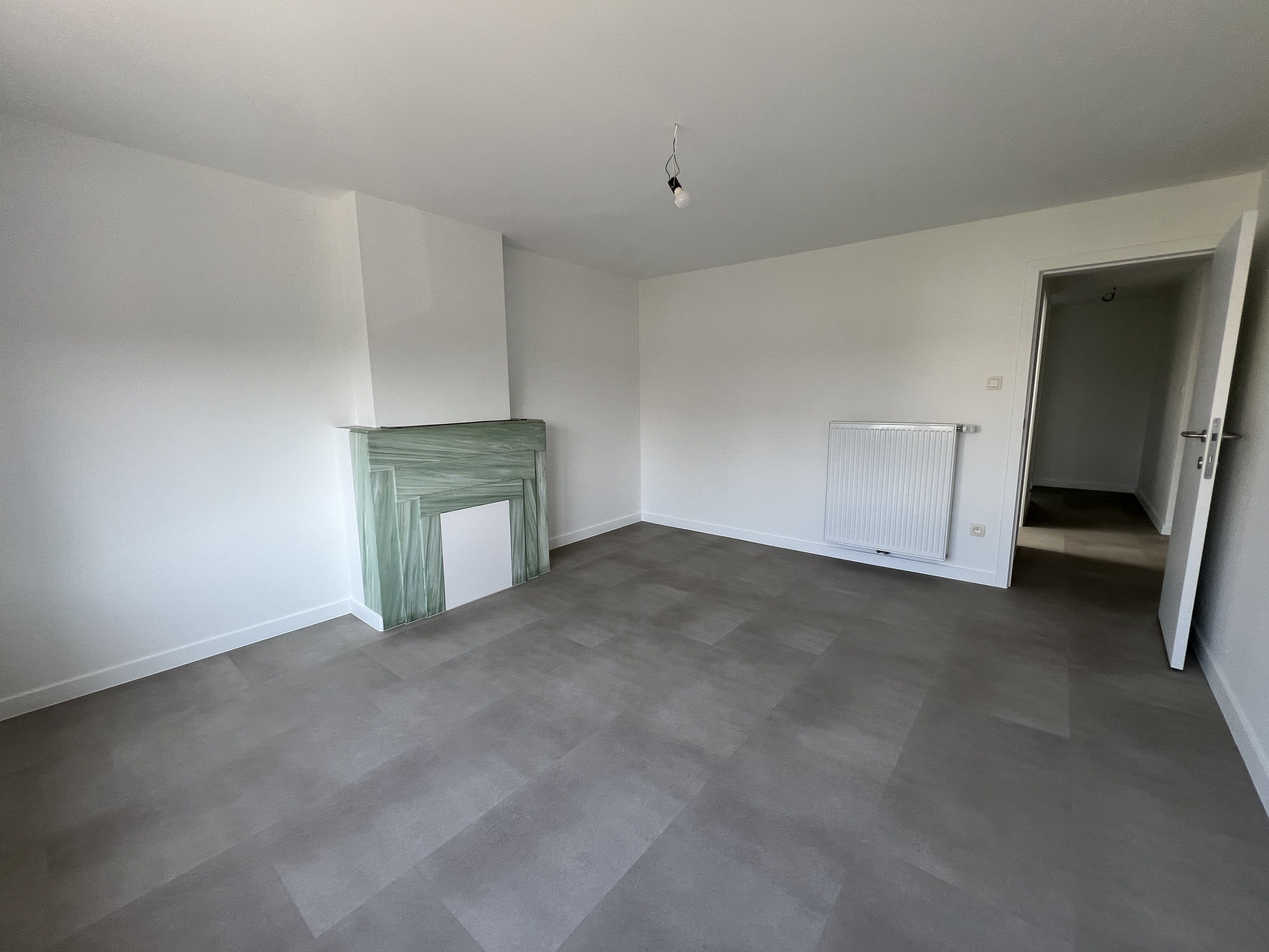 Volledig gerenoveerde energiezuinige driegevelwoning met 4 slaapkamers en tuin. foto 15