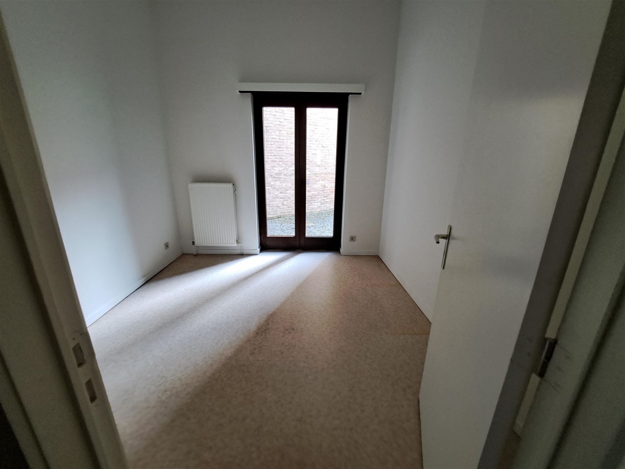 Ruim gelijkvloers appartement met 2 slaapkamers foto 6