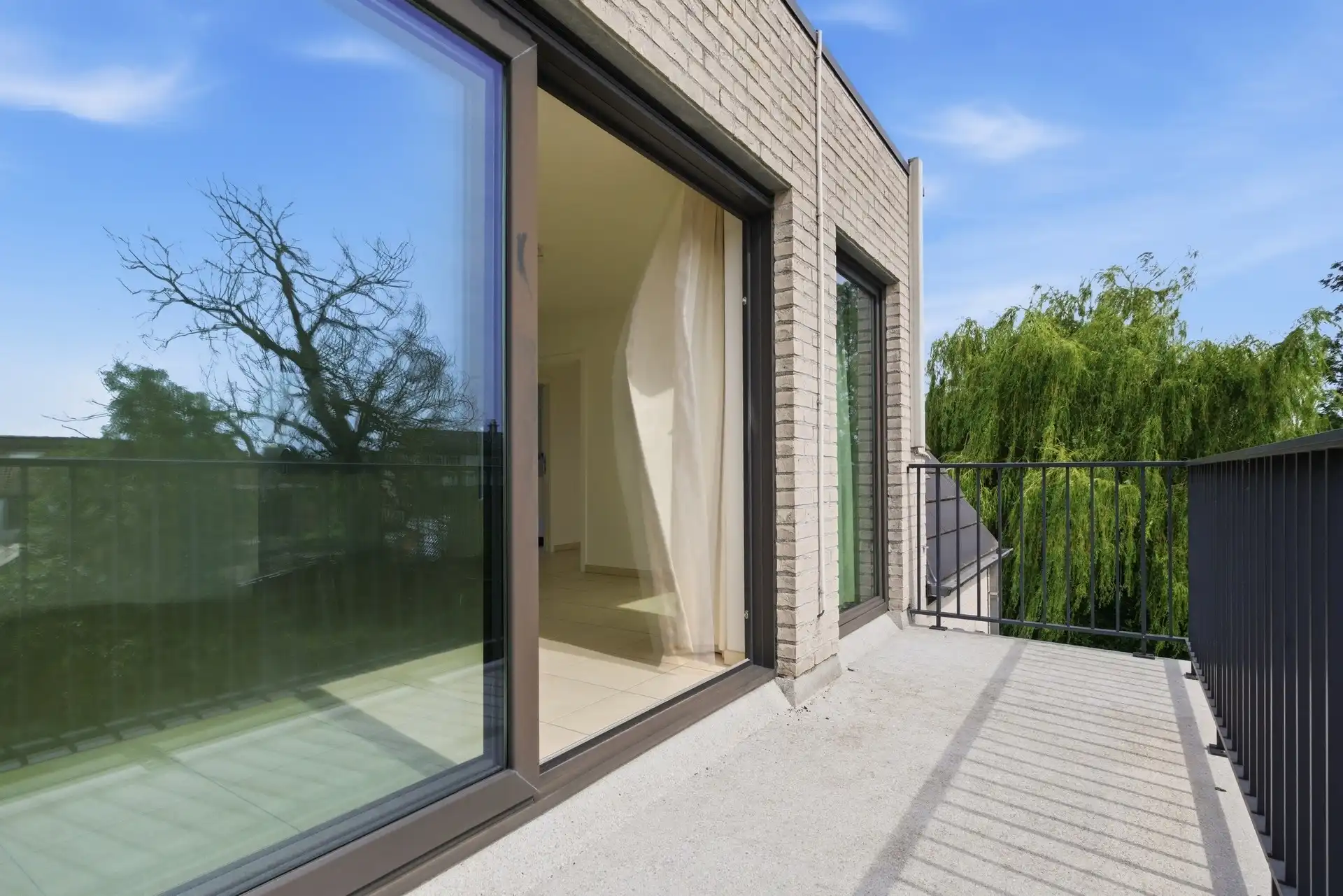 Modern en energiezuinig appartement op rustige locatie in doodlopende straat te Hamme foto 2