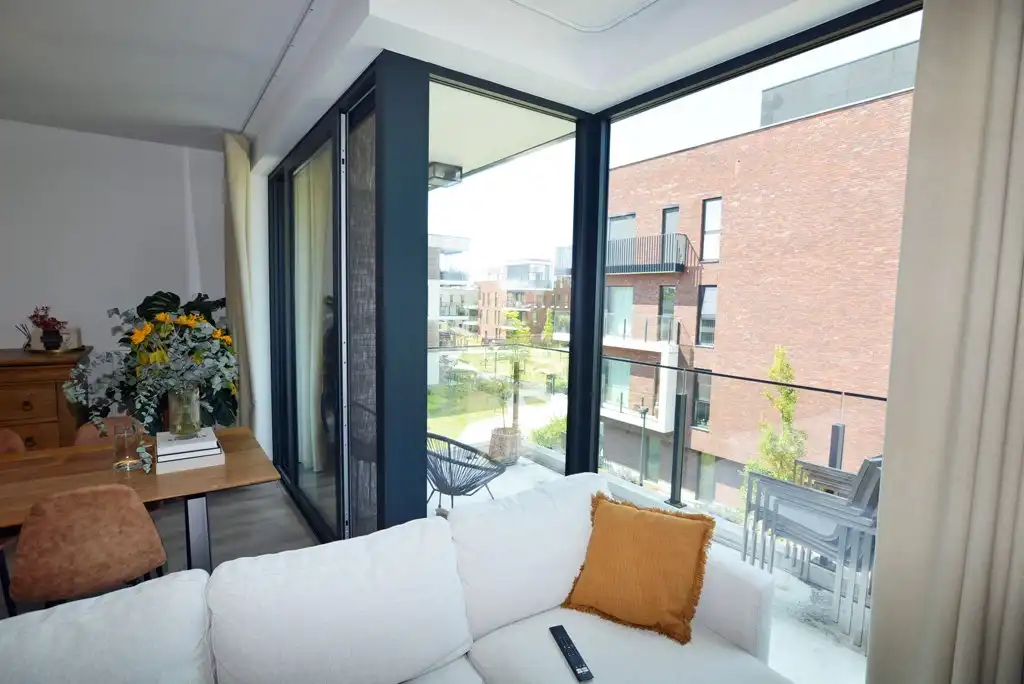 Modern, energiezuinig appartement met 2 slpks, terras, autostaanplaats en kelderberging. foto 6