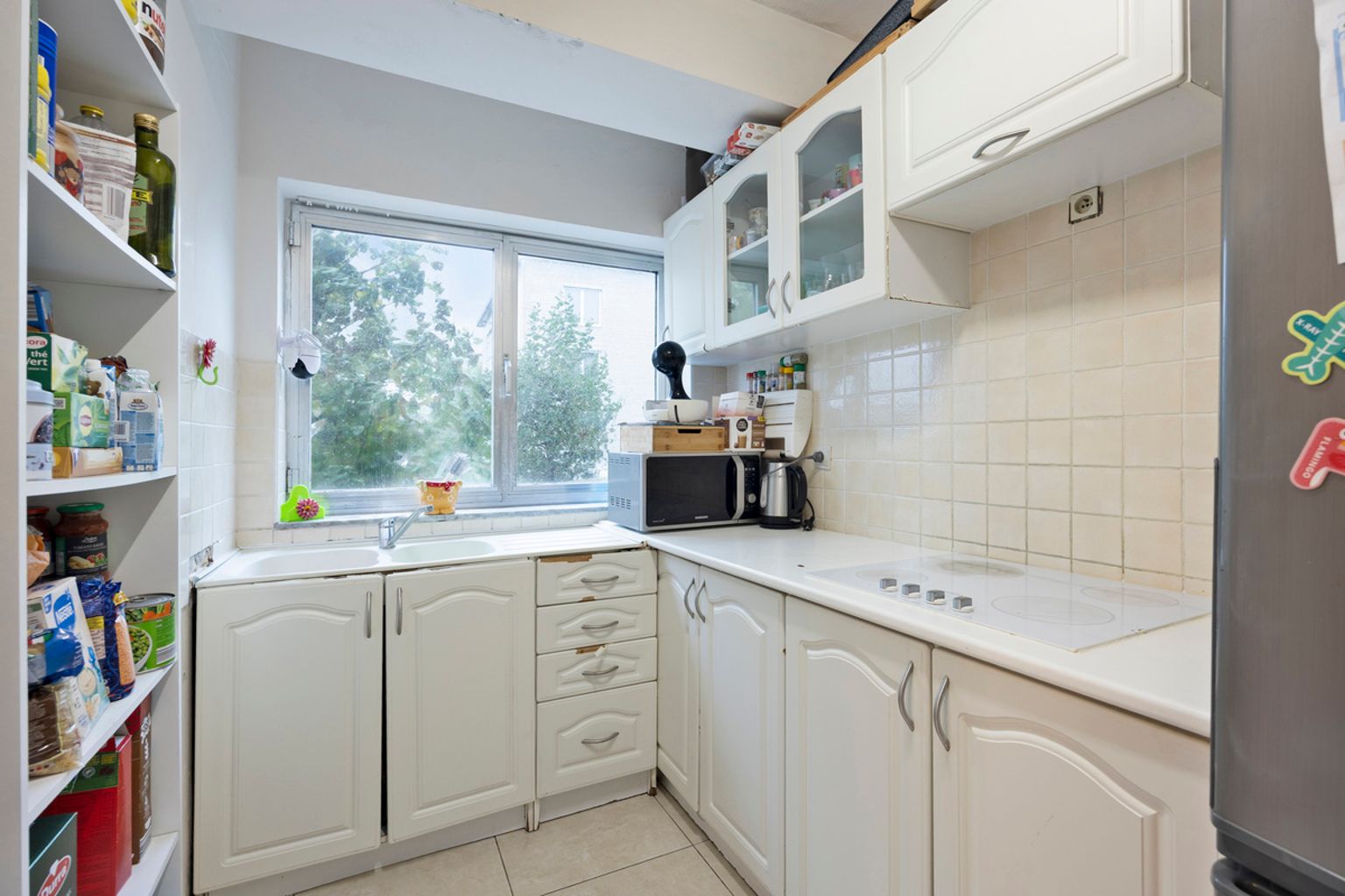 Instapklaar 1 slaapkamer lichtrijk en modern hoekappartement foto 6