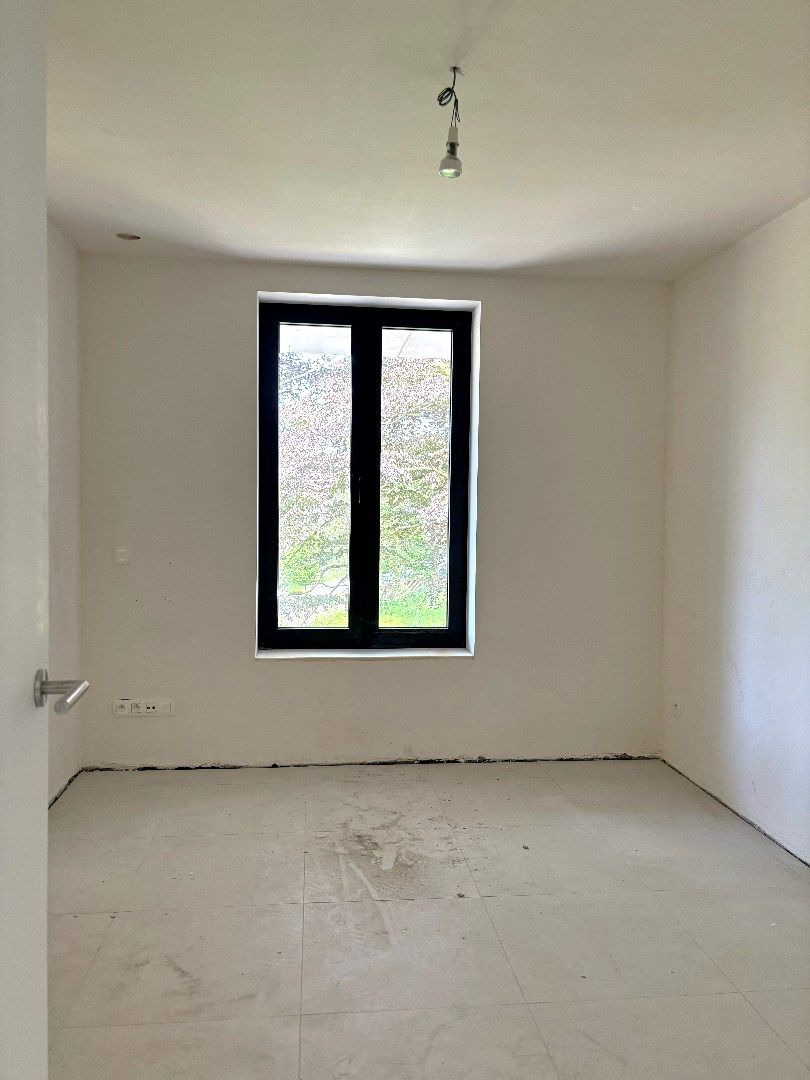 Nieuwbouw appartement op het gelijkvloers met twee slaapkamers en tuin in Oostakker foto 9