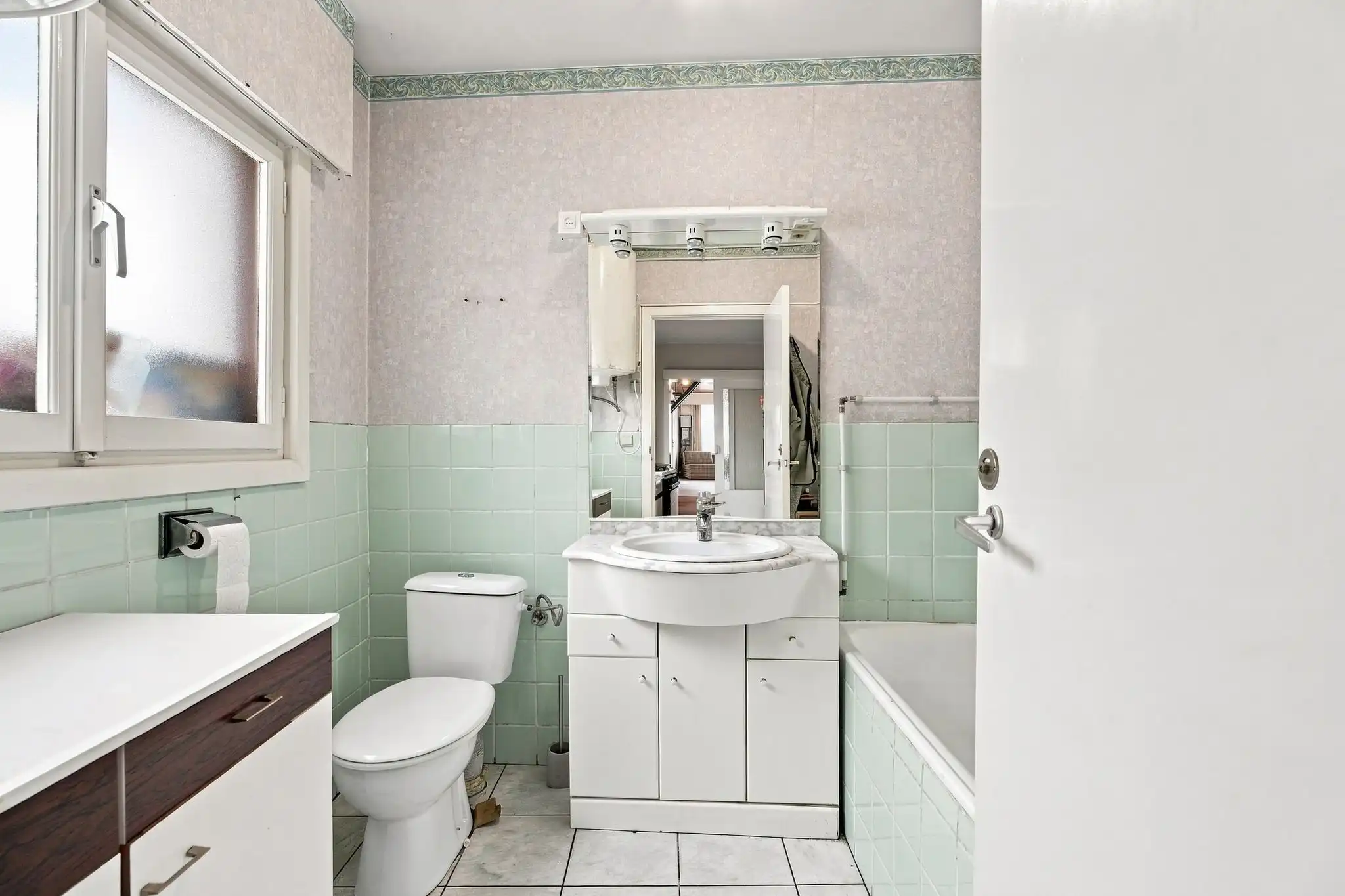 Ruime en praktische te renoveren rijwoning in Sint-Michiels foto 6