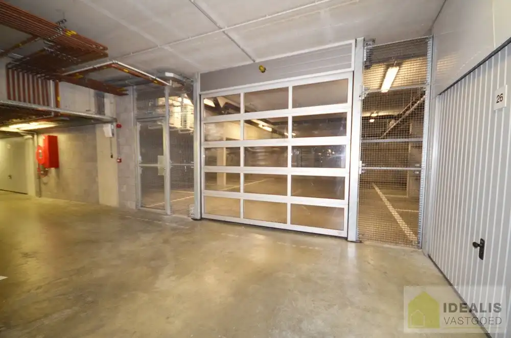 RUIME EN AFGESLOTEN PARKEERPLAATS IN HARTJE PELT ALS ONDERDEEL VAN DE ONDERGRONDSE PARKEERGARAGE FORTE! foto {{pictureIndex}}