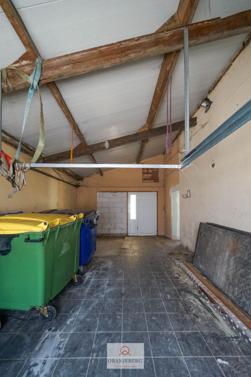 Ideaal te renoveren rijwoning + werkplaats + garage + tuin voor 591m² foto 25