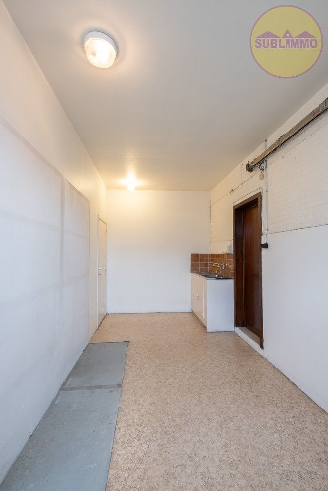 Op te frissen handelswoning met 5 slaapkamers te Tessenderlo-Ham foto 5