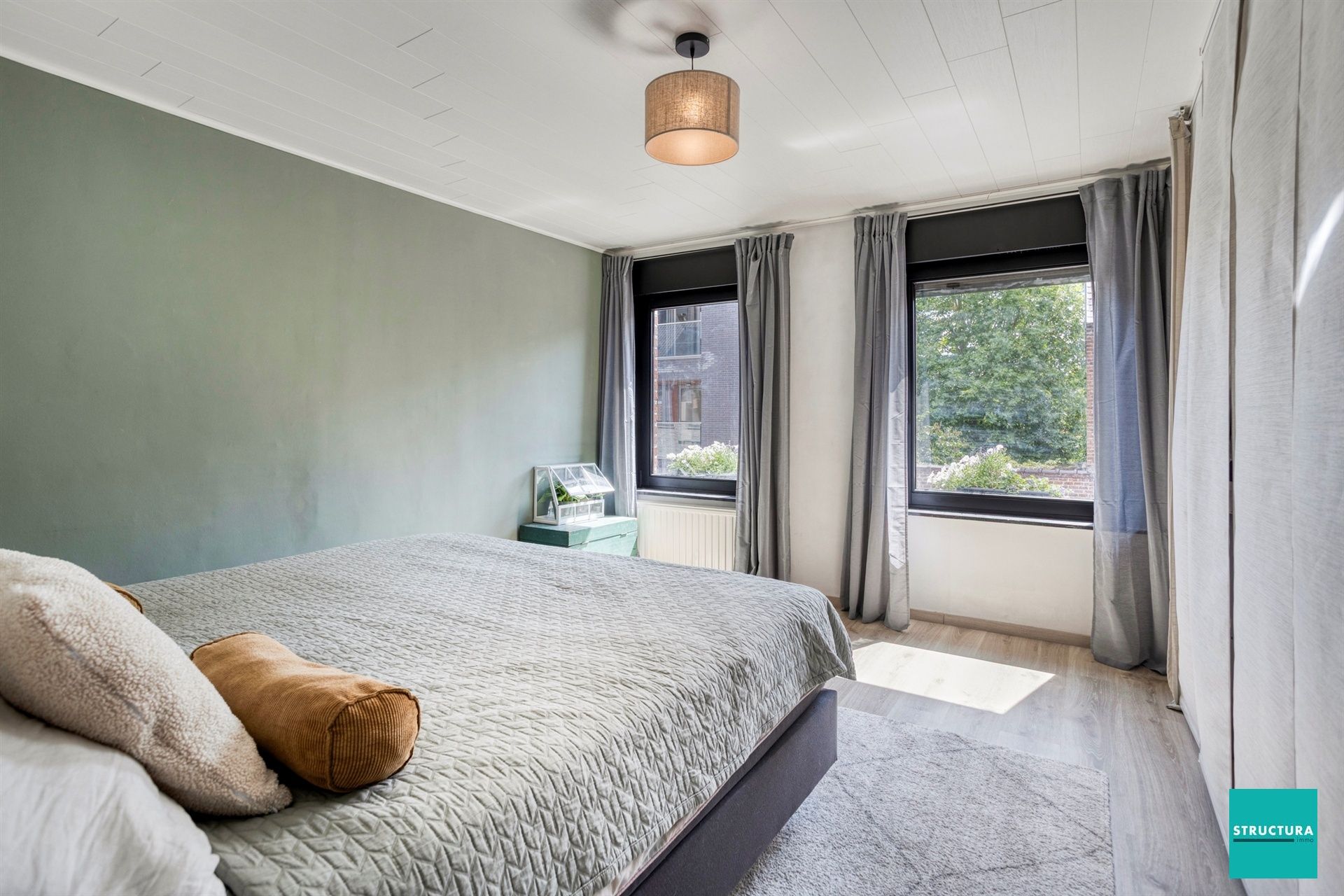 Instapklare woning met karakter in hartje Merchtem foto 22