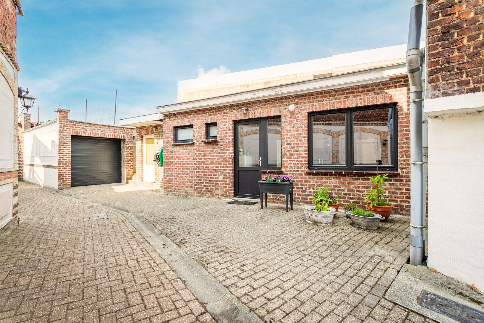 Instapklare woning op 9a30, met 3 slpks, garage en tuin  foto 11