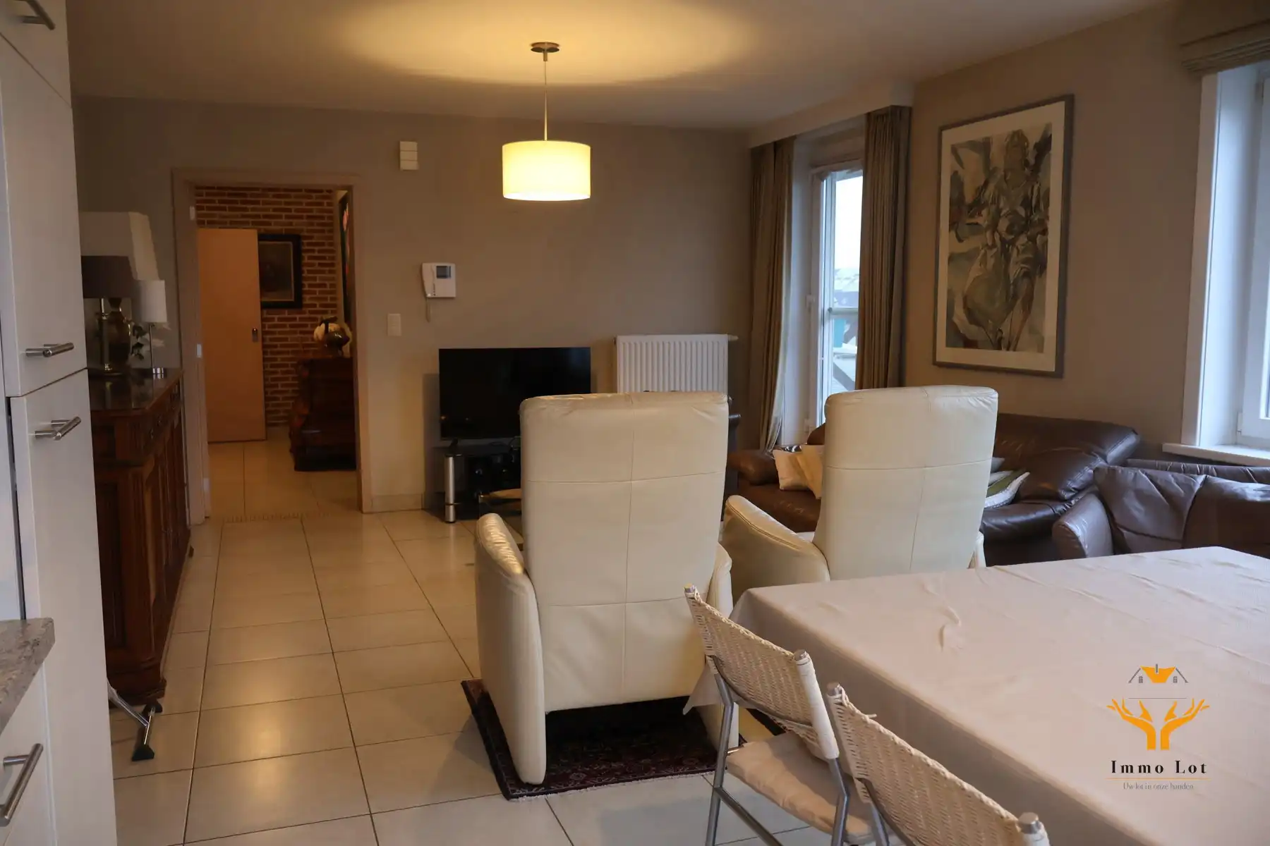 Gezellig appartement met terras en garage - huurprijs inclusief verwarming en water foto 4