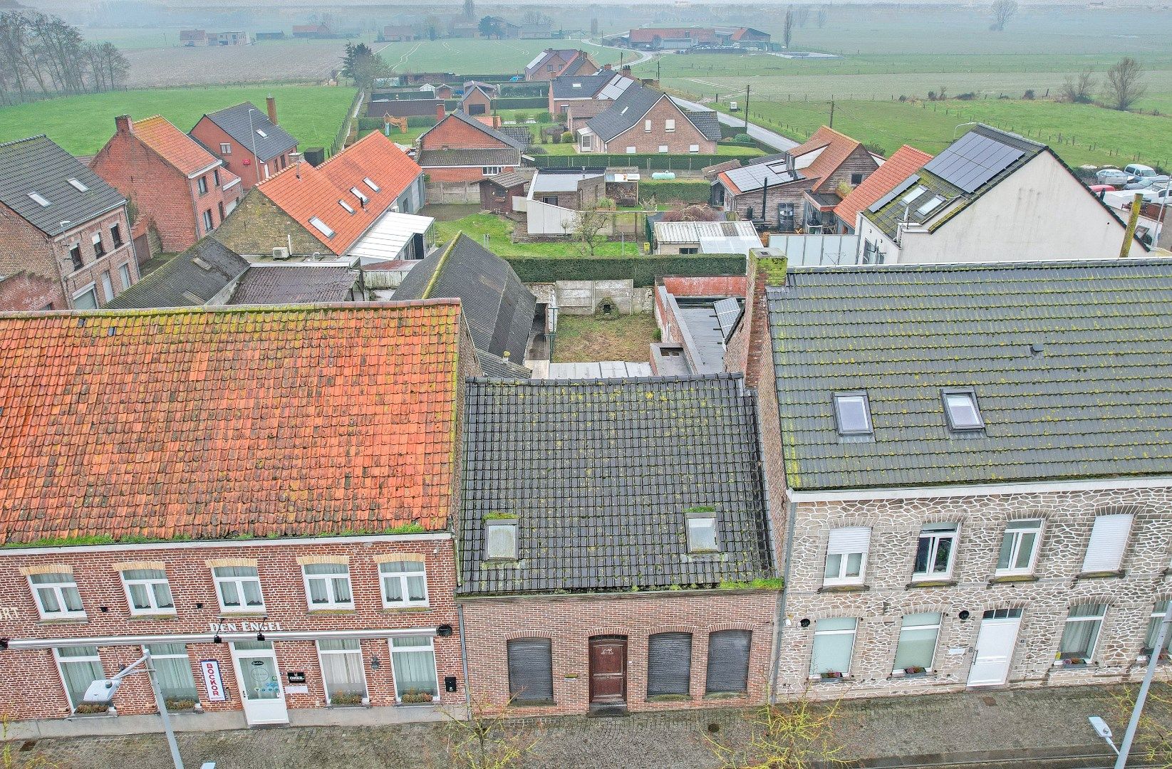 Te renoveren woning met 3 slaapkamers en zongerichte tuin. foto 18