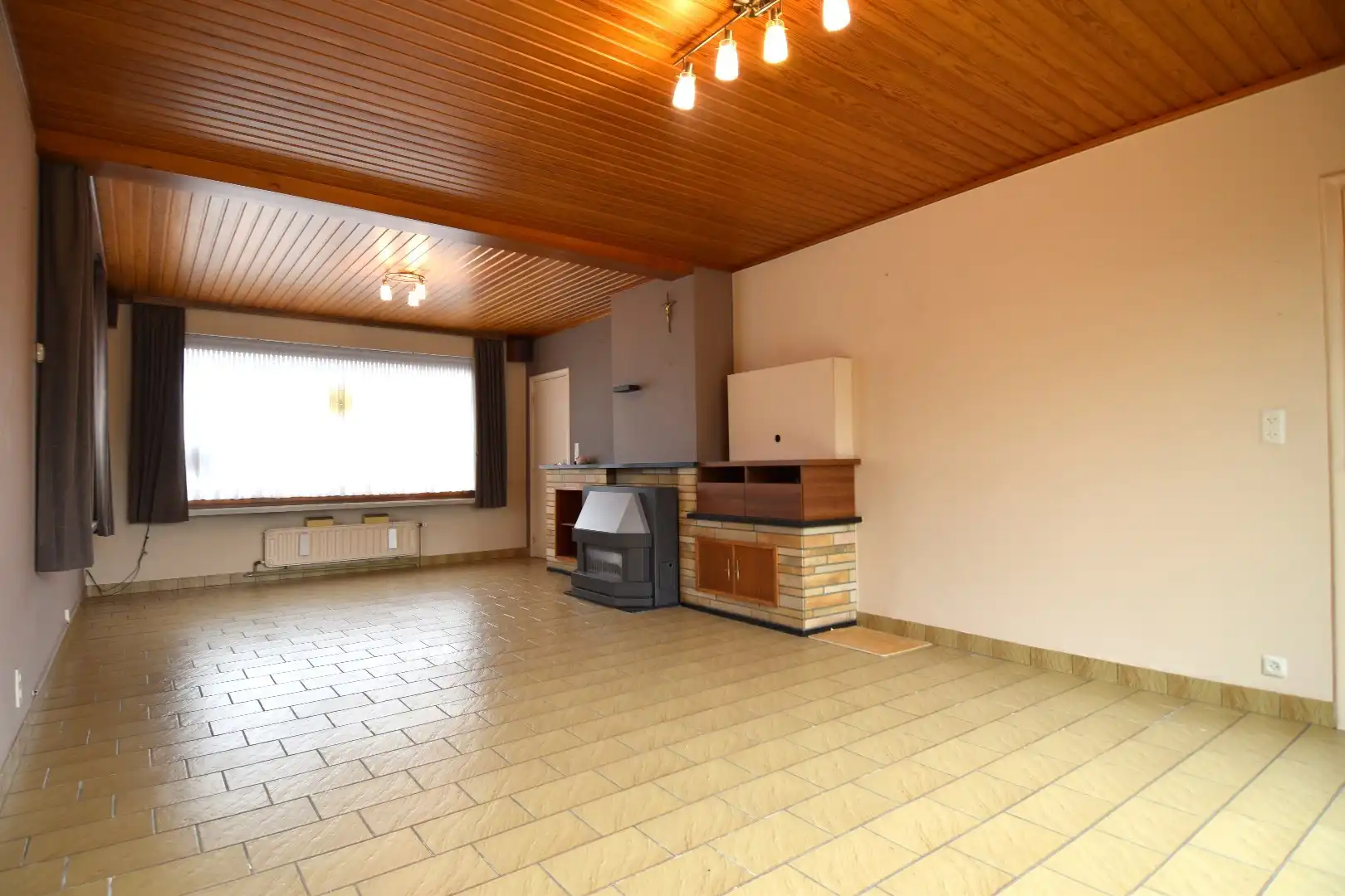 Woning op hoekperceel met 3 slaapkamers, garage en zalige tuin te koop in Gullegem foto 3