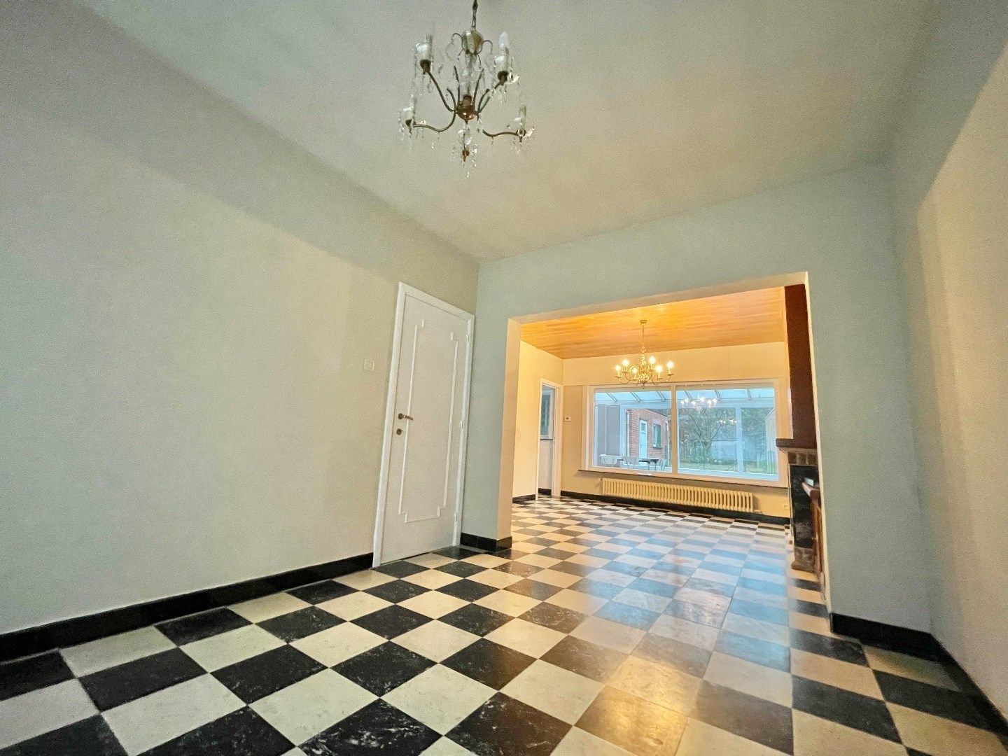 Grote woning met mogelijks vier kamers, garage en ruime tuin foto 6